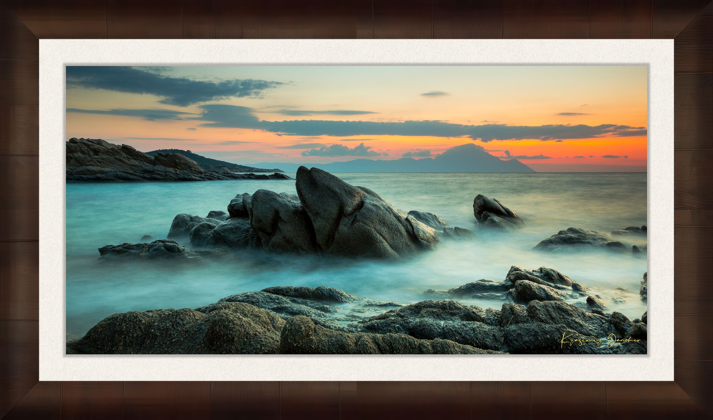 Sunrise long exposure at Sarti featuring coastal rock formations, sea stacks, cloud-covered sky, and soft waves. #Finish_Roma Cigar Leaf Frame & Bright Liner