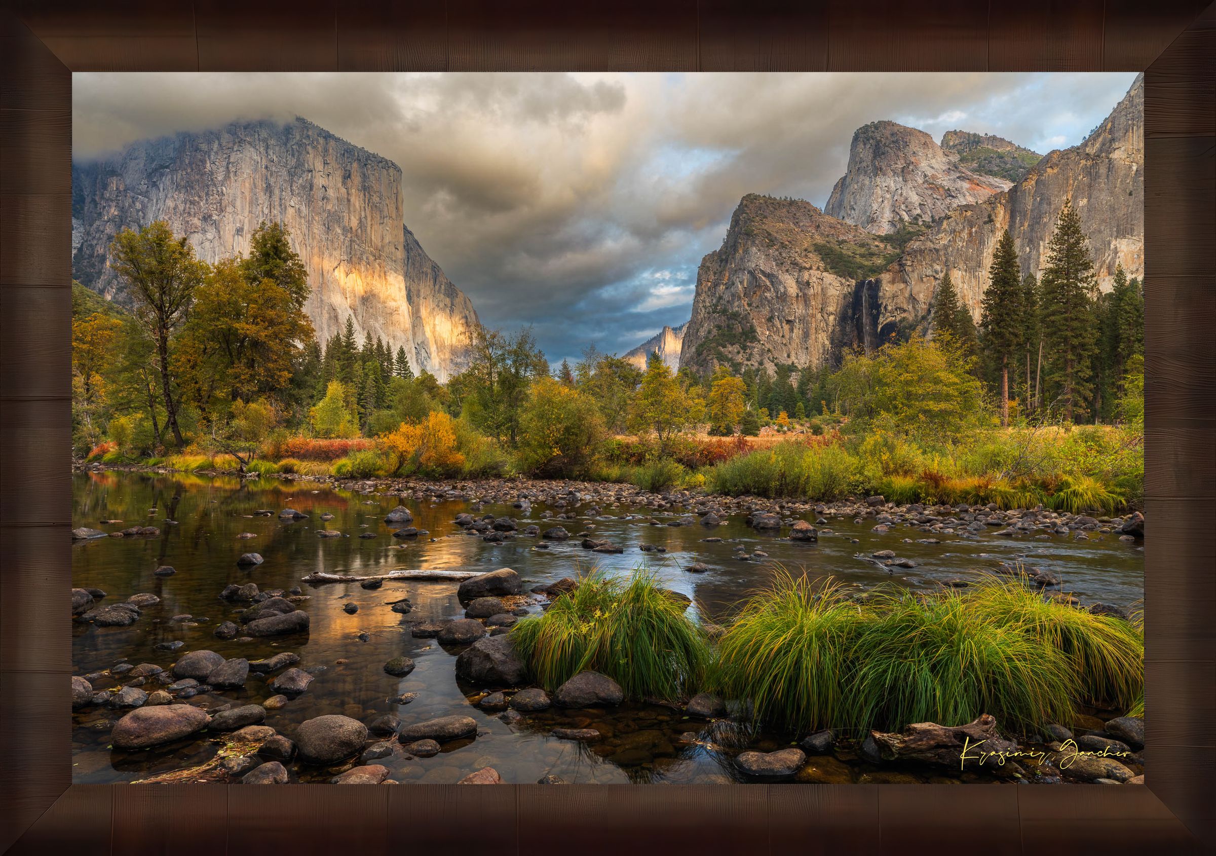 El Capitan at sunset in Yosemite Valley, golden light reflecting off the river amid clouds and seasonal tree colors. #Finish_Roma Cigar Leaf Frame