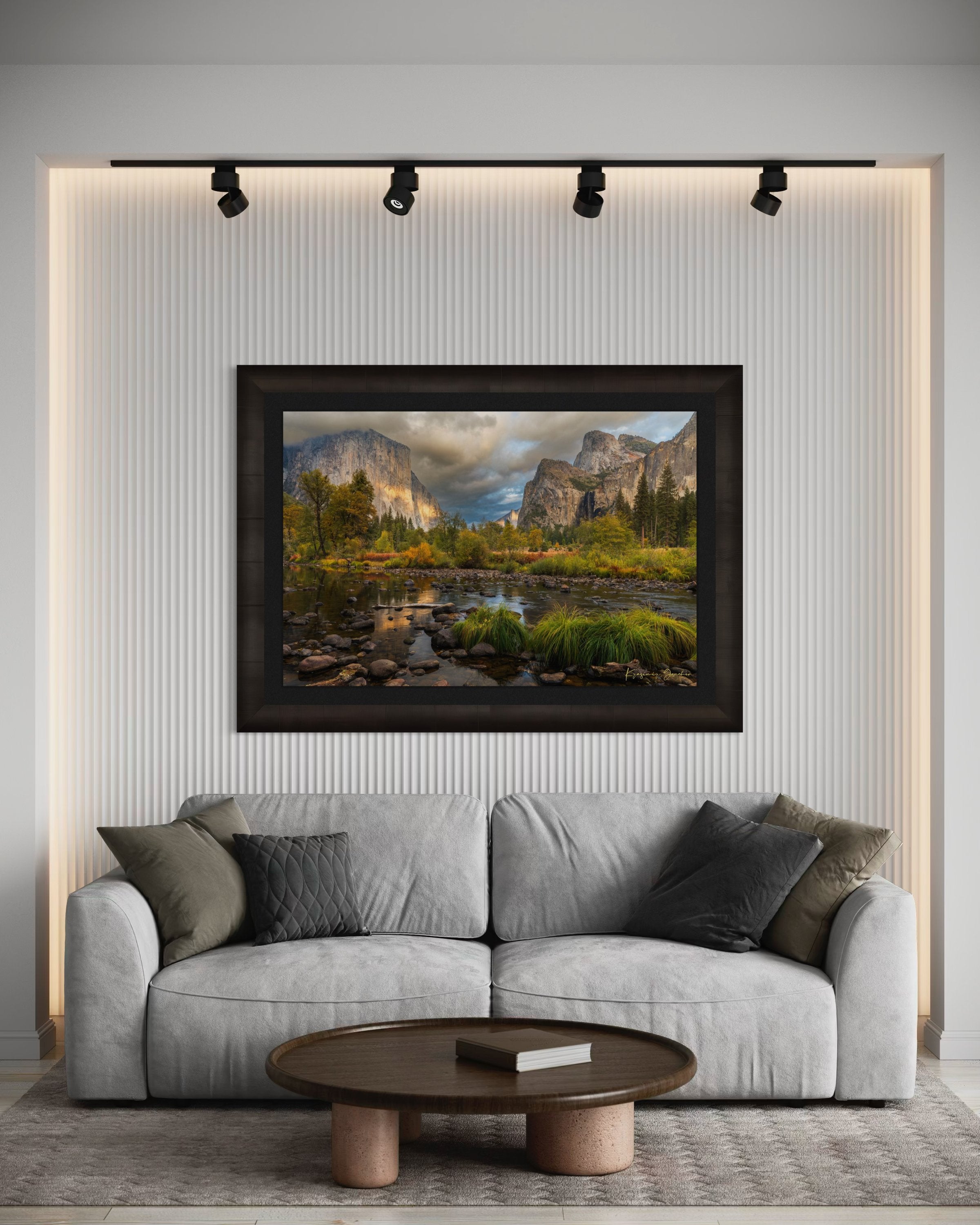El Capitan at sunset in Yosemite Valley, golden light reflecting off the river amid clouds and seasonal tree colors. #Finish_Roma Dark Ash Frame & Dark Liner