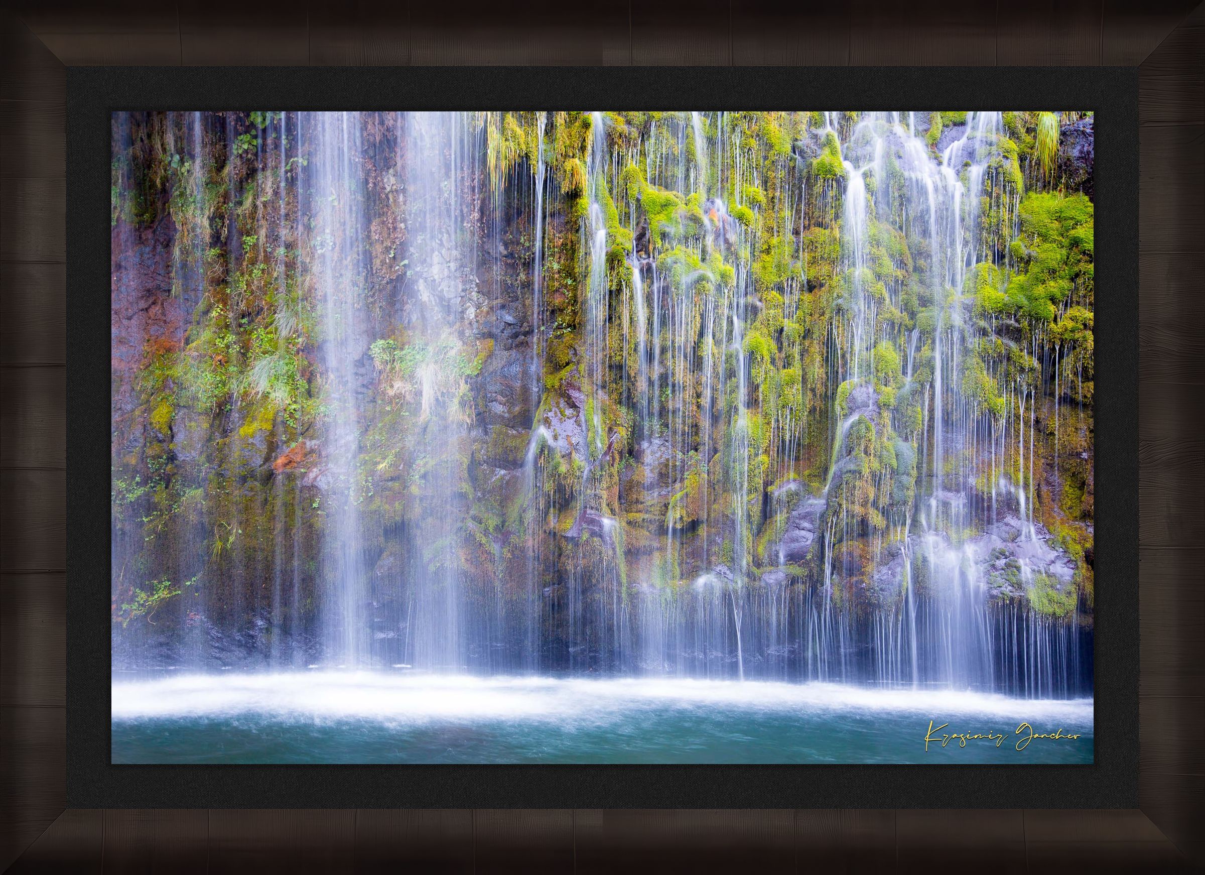 Waterfall cascading through a forested gorge at Mossbrae Falls during daylight with visible mist and dynamic movement. #Finish_Roma Dark Ash Frame & Dark Liner