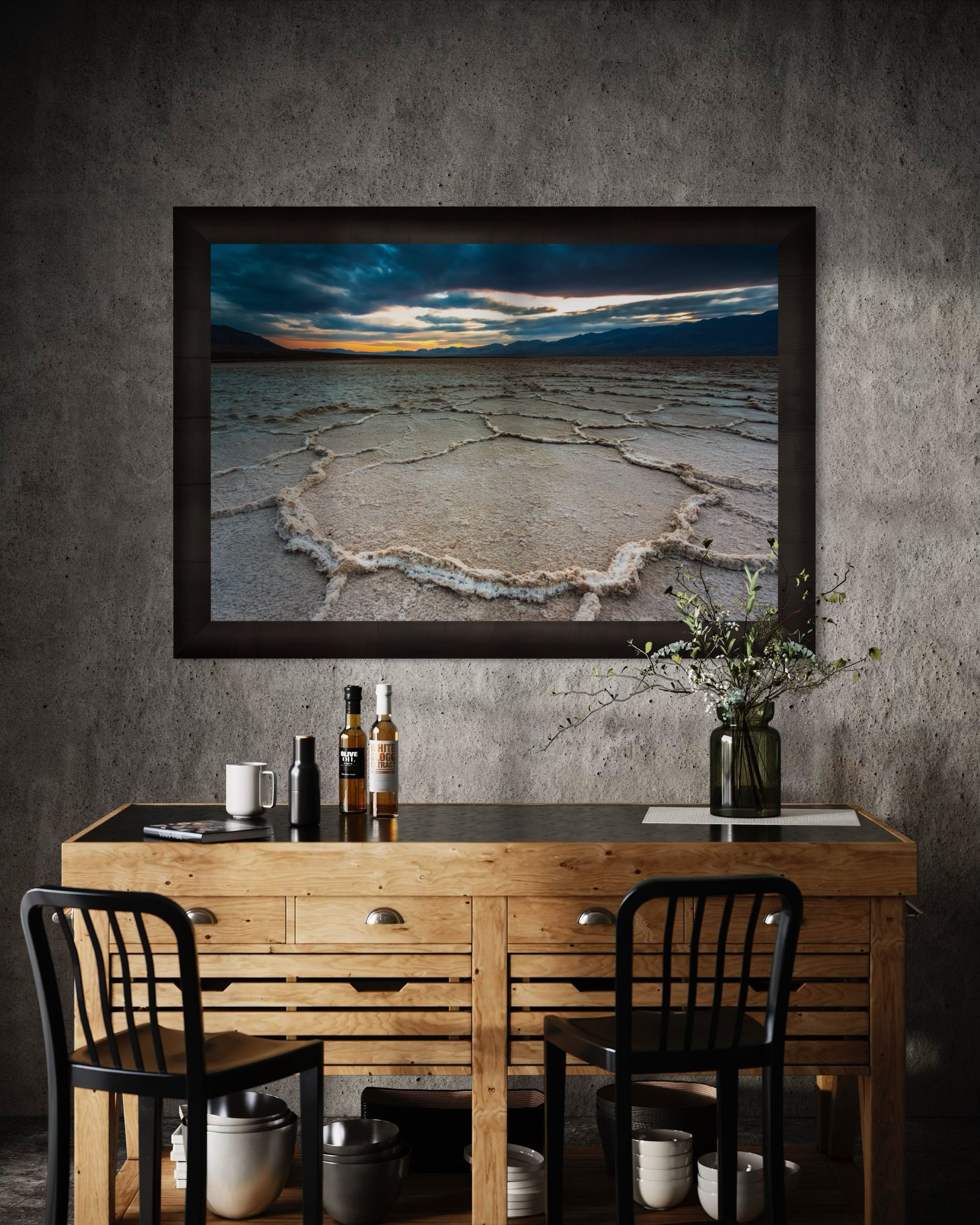 Expansive desert salt flat of Badwater Basin beneath a sky filled with storm clouds and setting sun in Death Valley. #Finish_Roma Dark Ash Frame