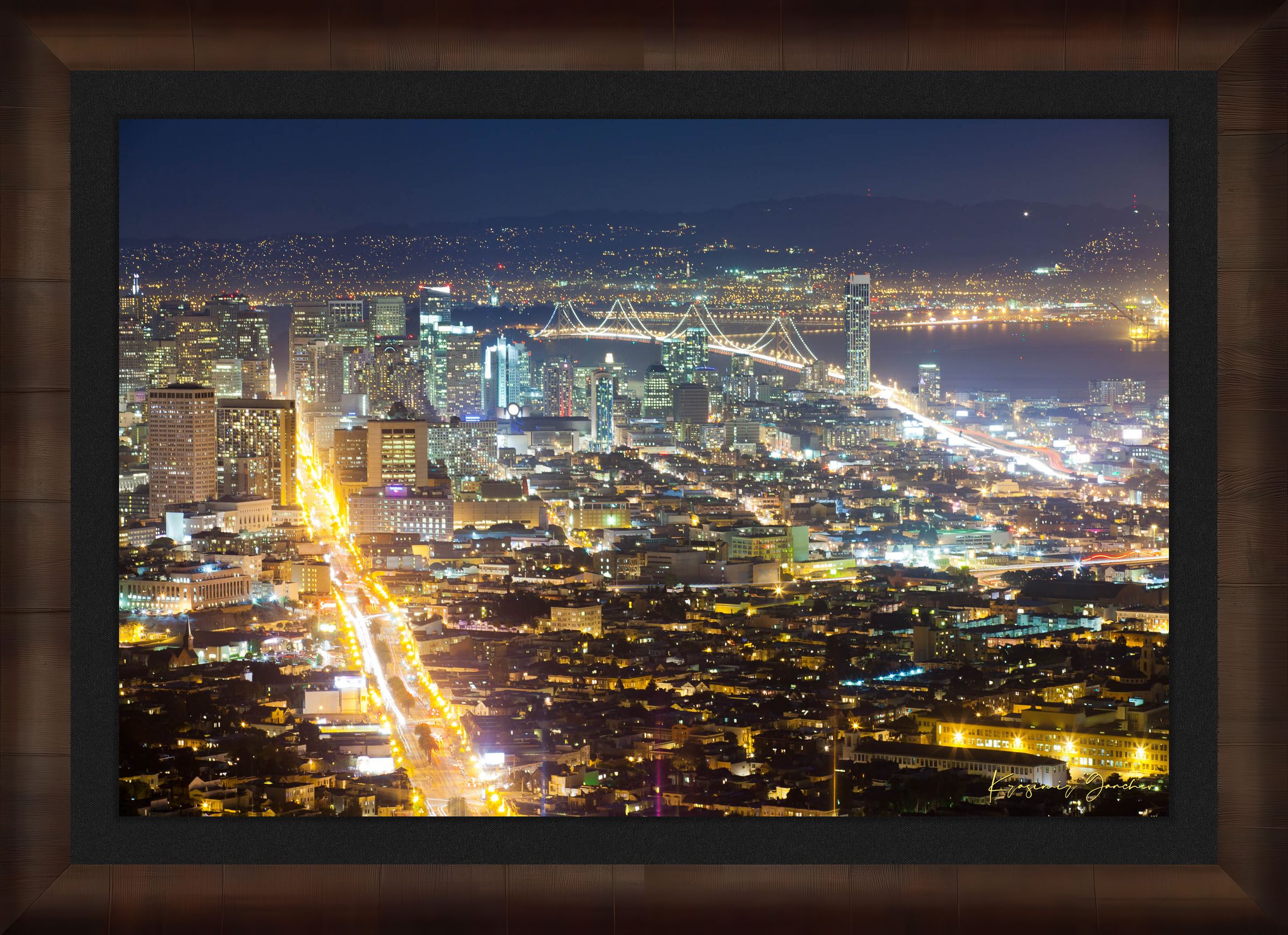 Nighttime panoramic view from Twin Peaks, San Francisco, with illuminated city lights reflected on the bay through a layer of mist. #Finish_Roma Cigar Leaf Frame & Dark Liner