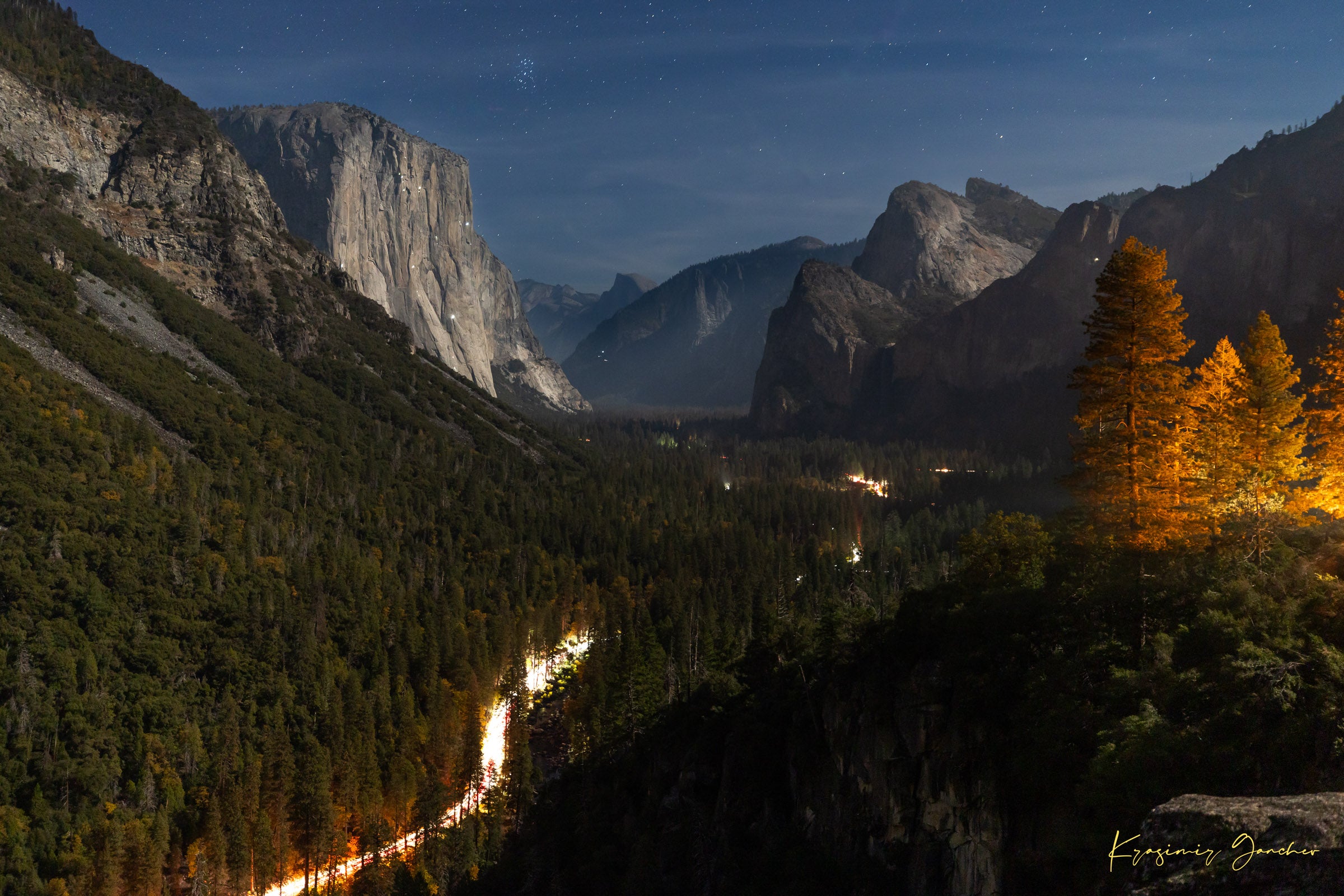 El Capitan at night in Yosemite Valley, moonlight revealing climbing gear and waterfall with clouds above, serene wilderness scene. #Finish_Acrylic Recess