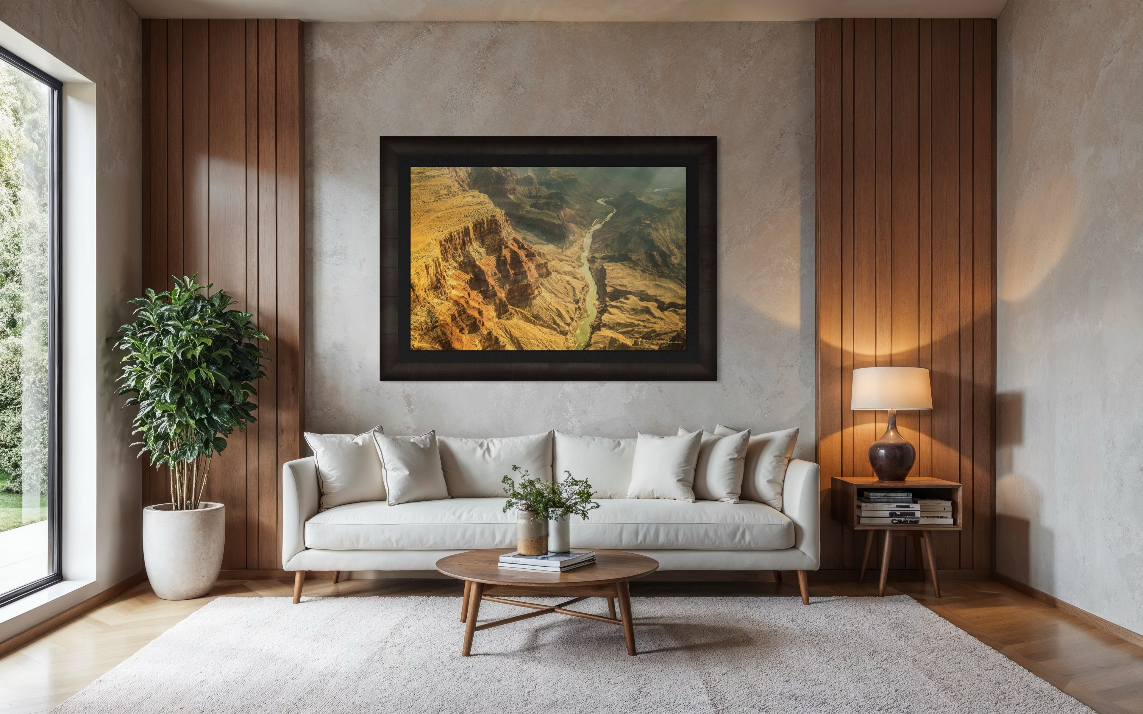 Colorado River traversing the Grand Canyon chasm in daylight, visible geological formations shrouded in haze. #Finish_Roma Dark Ash Frame & Dark Liner