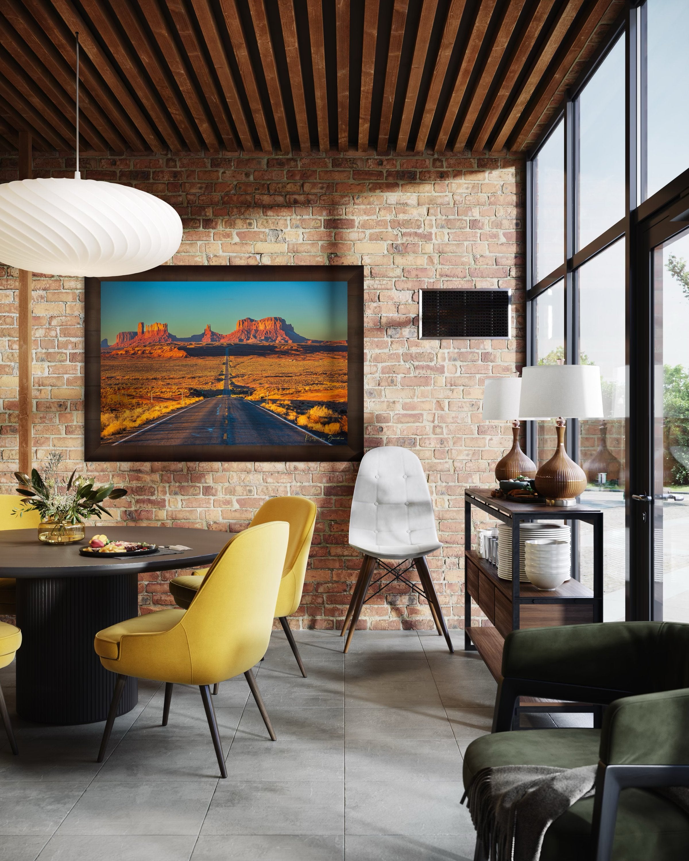 A winding road leads toward distant mesas under a hazy sky in Monument Valley, bathed in warm daylight and soft morning light. #Finish_Roma Cigar Leaf Frame