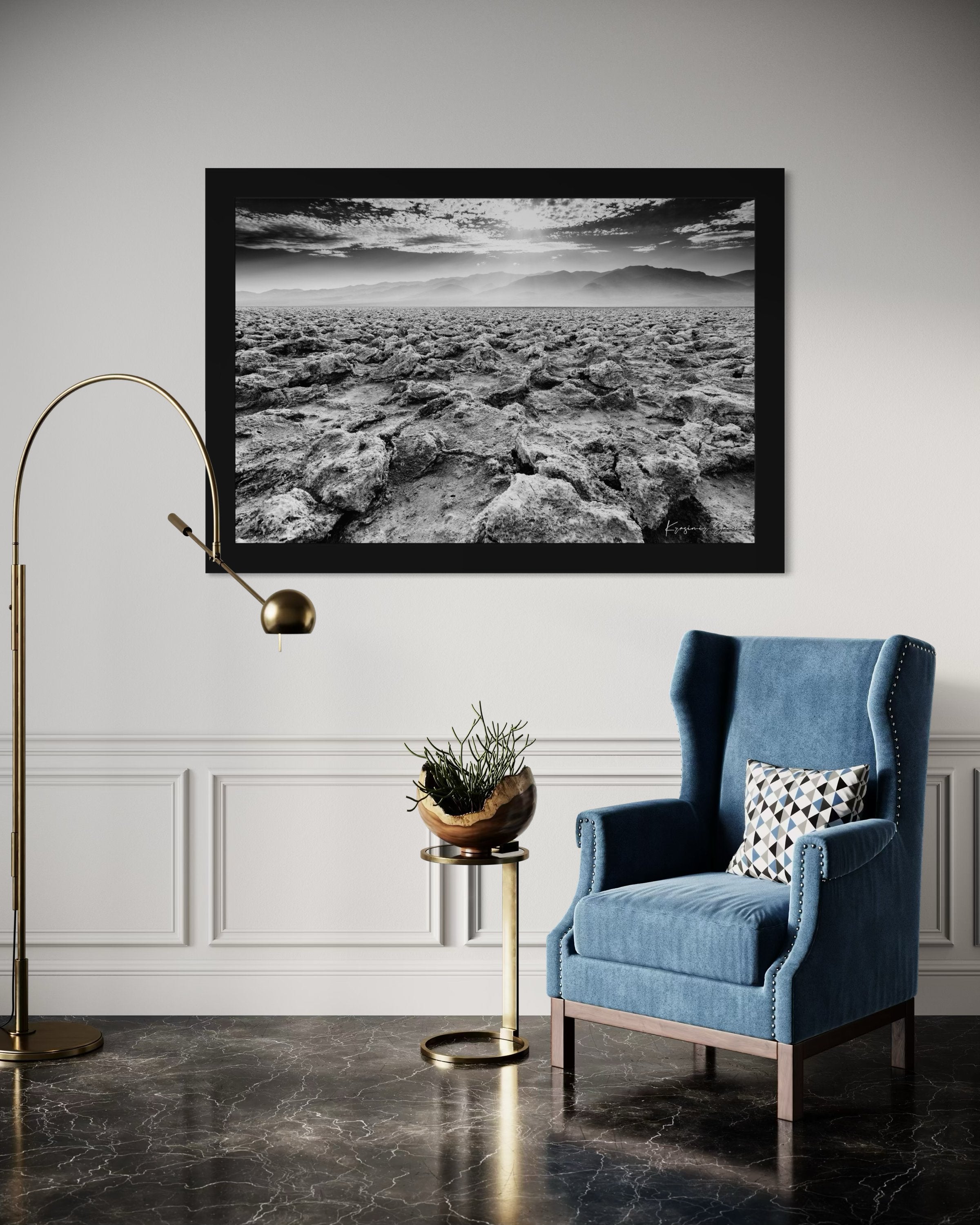 Textured salt pan terrain at Devil's Golf Course in Death Valley National Park under daytime light. #Finish_Roma Satin Black Frame