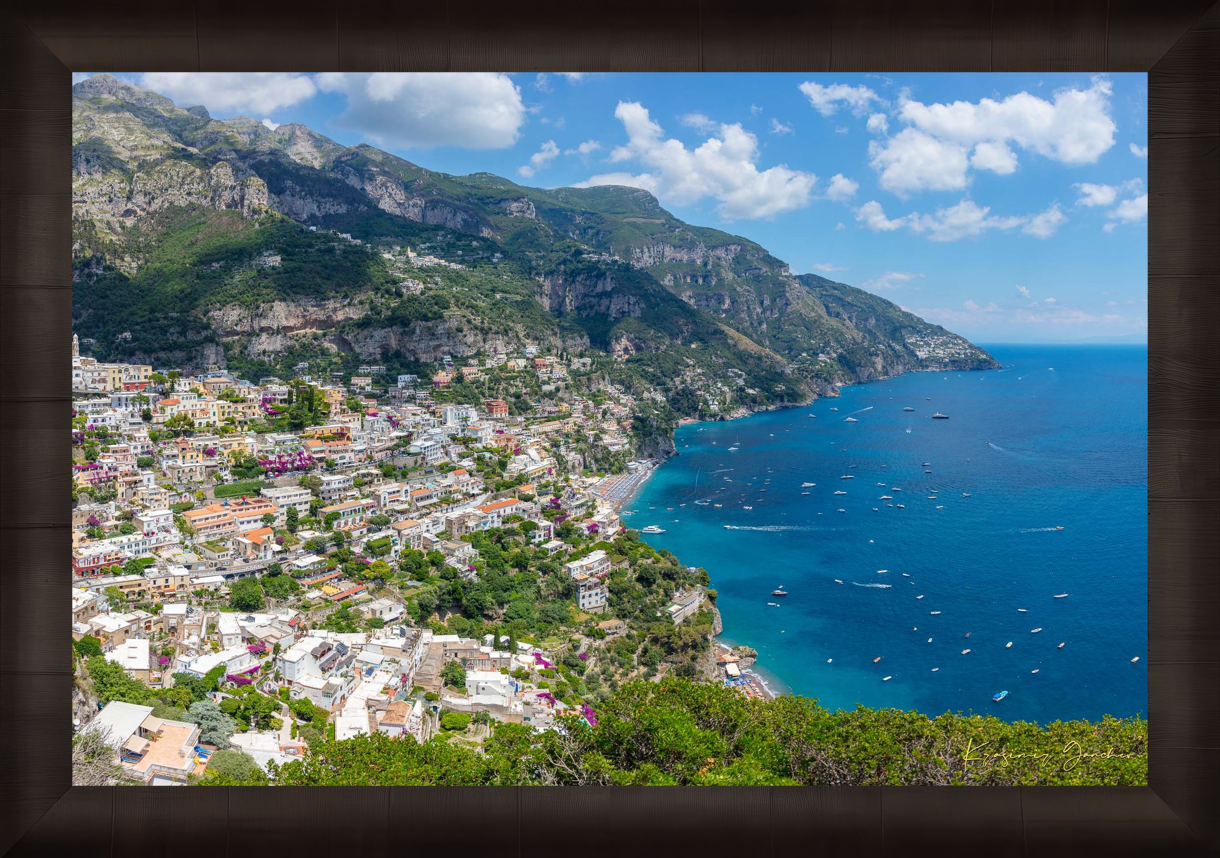 Coastal town of Portofino, Italy, overlooking the Mediterranean Sea with lush green mountains and clear blue sky. #Finish_Roma Dark Ash Frame