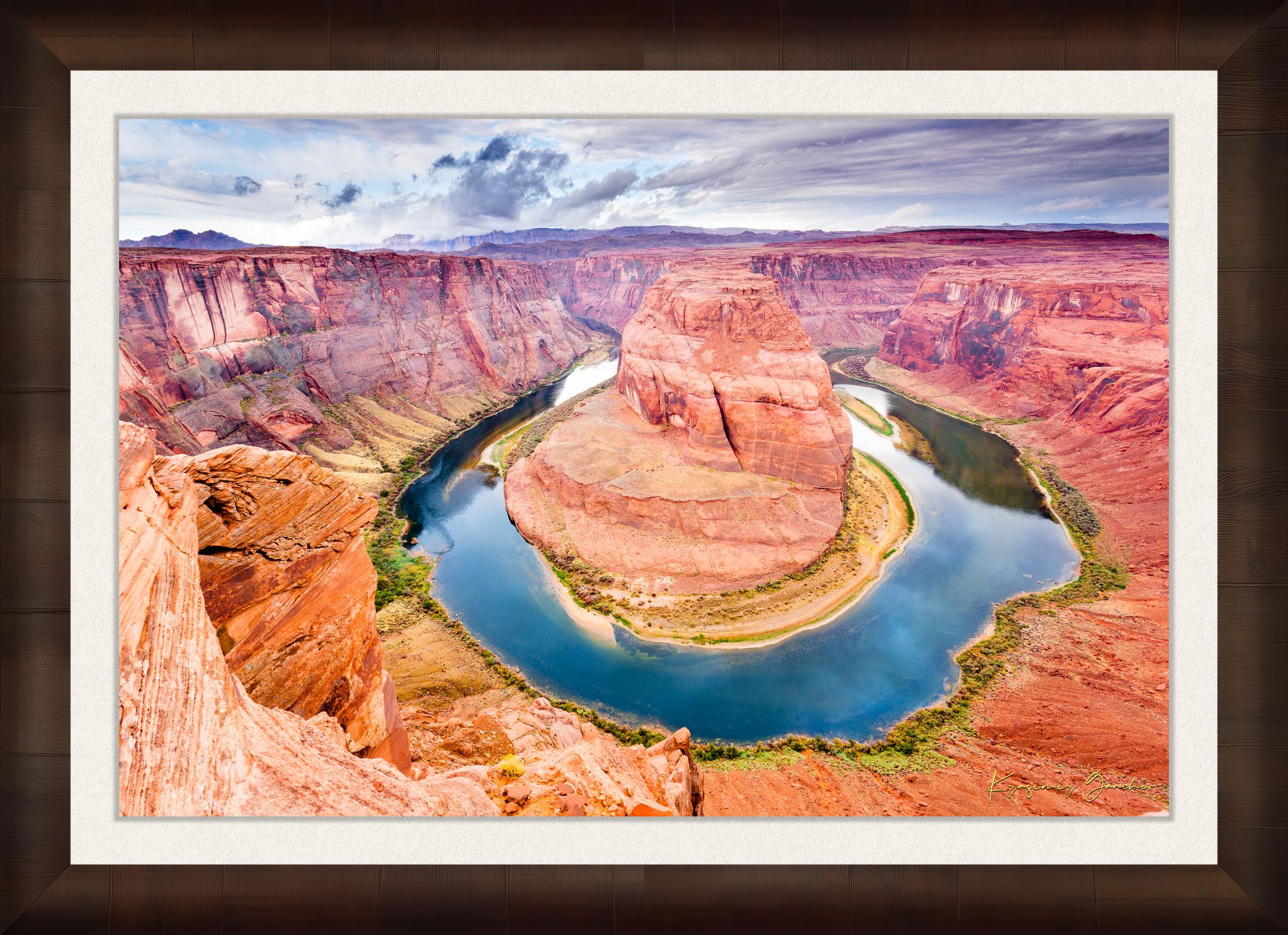 Colorado River curves through Horseshoe Bend at dawn. Water reflects sunlight and surrounding red rock cliffs under cloudy skies. #Finish_Roma Cigar Leaf Frame & Bright Liner