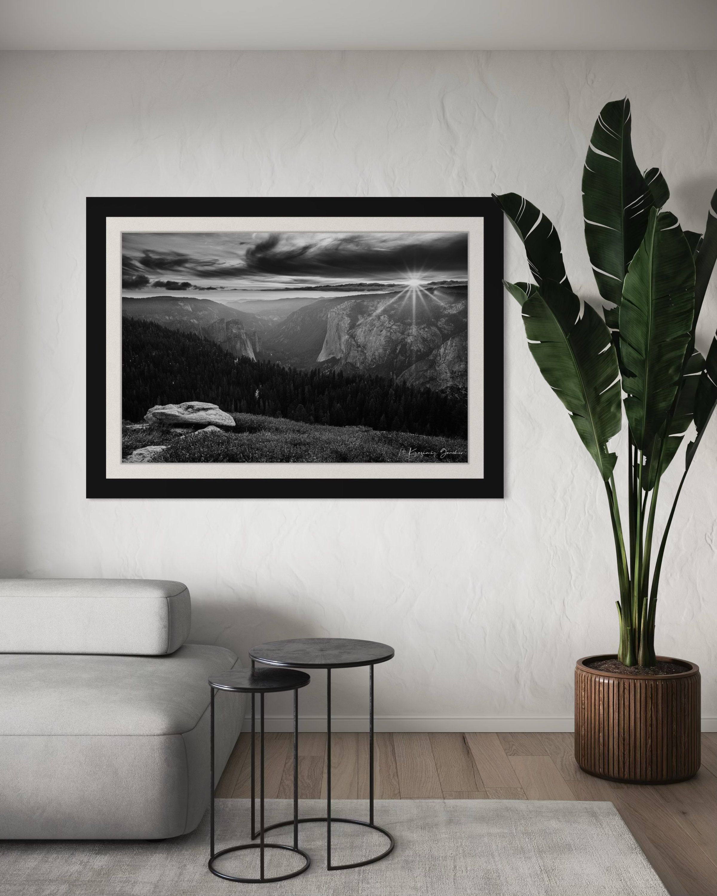 El Capitan at sunset, radiant starburst above horizon casting long shadows on valley terrain. #Finish_Roma Satin Black Frame & Bright Liner