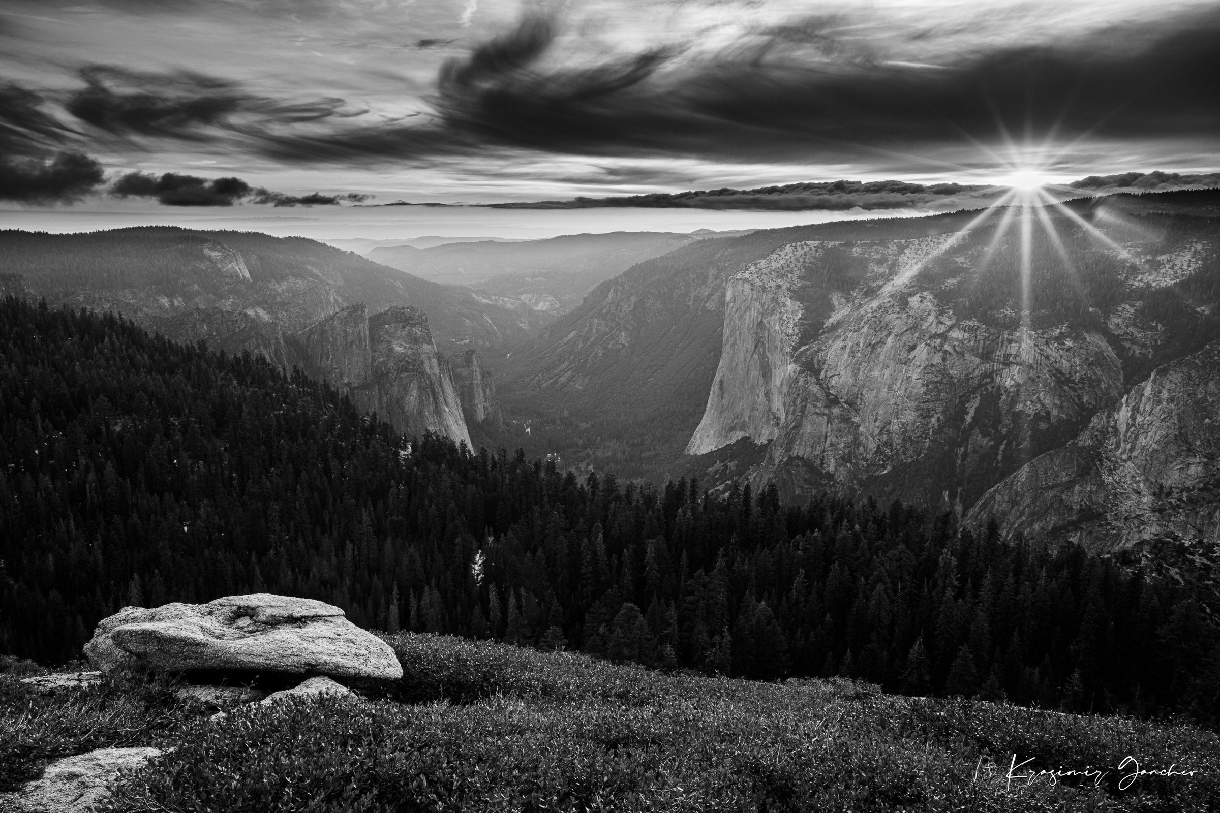 El Capitan at sunset, radiant starburst above horizon casting long shadows on valley terrain. #Finish_Acrylic Recess