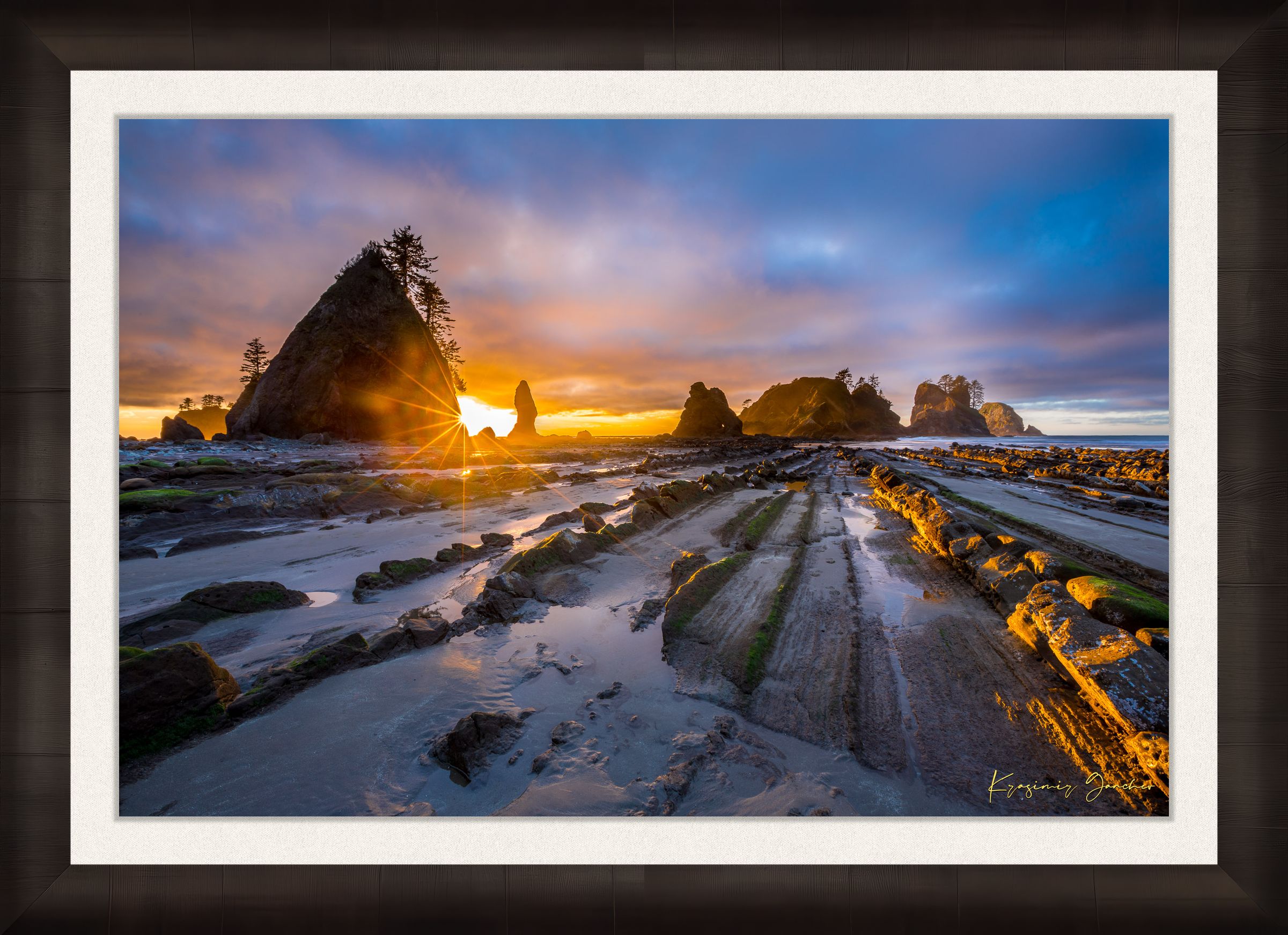 Golden sunset over ocean waves at Shi Shi Beach; silhouetted sea stacks stand against cloudy skies. #Finish_Roma Dark Ash Frame & Bright Liner