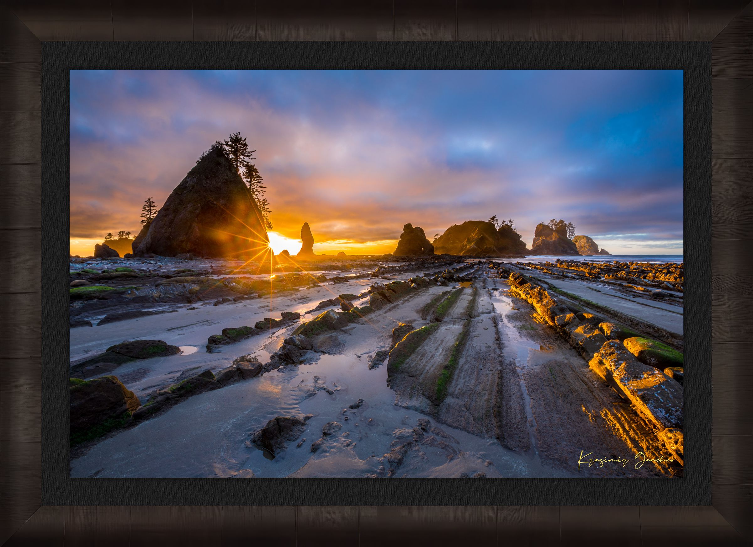 Golden sunset over ocean waves at Shi Shi Beach; silhouetted sea stacks stand against cloudy skies. #Finish_Roma Dark Ash Frame & Dark Liner