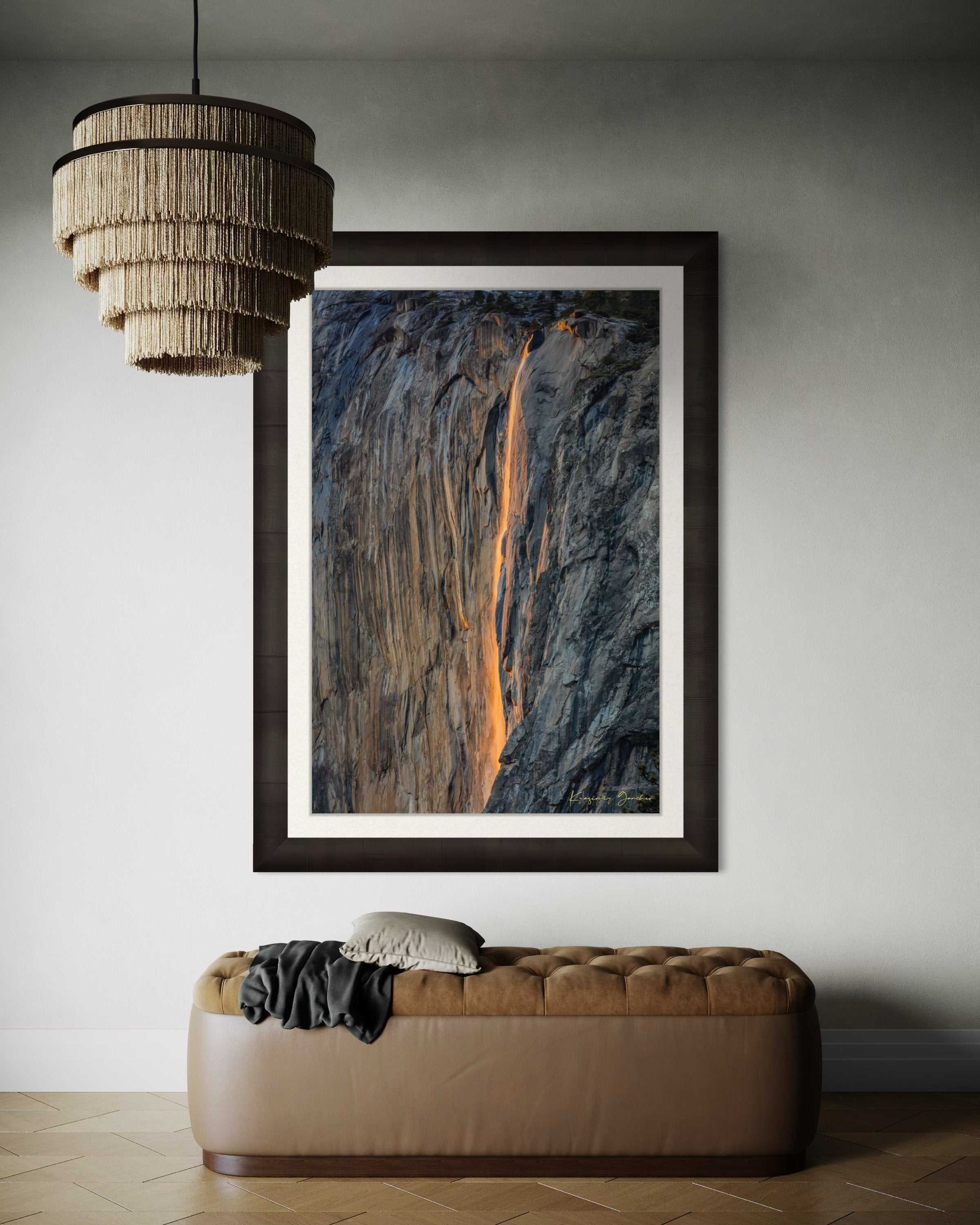 Detailed view of the firefall effect on El Capitan monolith with glowing sunlight refracting through mist from Horsetail Fall in Yosemite. #Finish_Roma Dark Ash Frame & Bright Liner