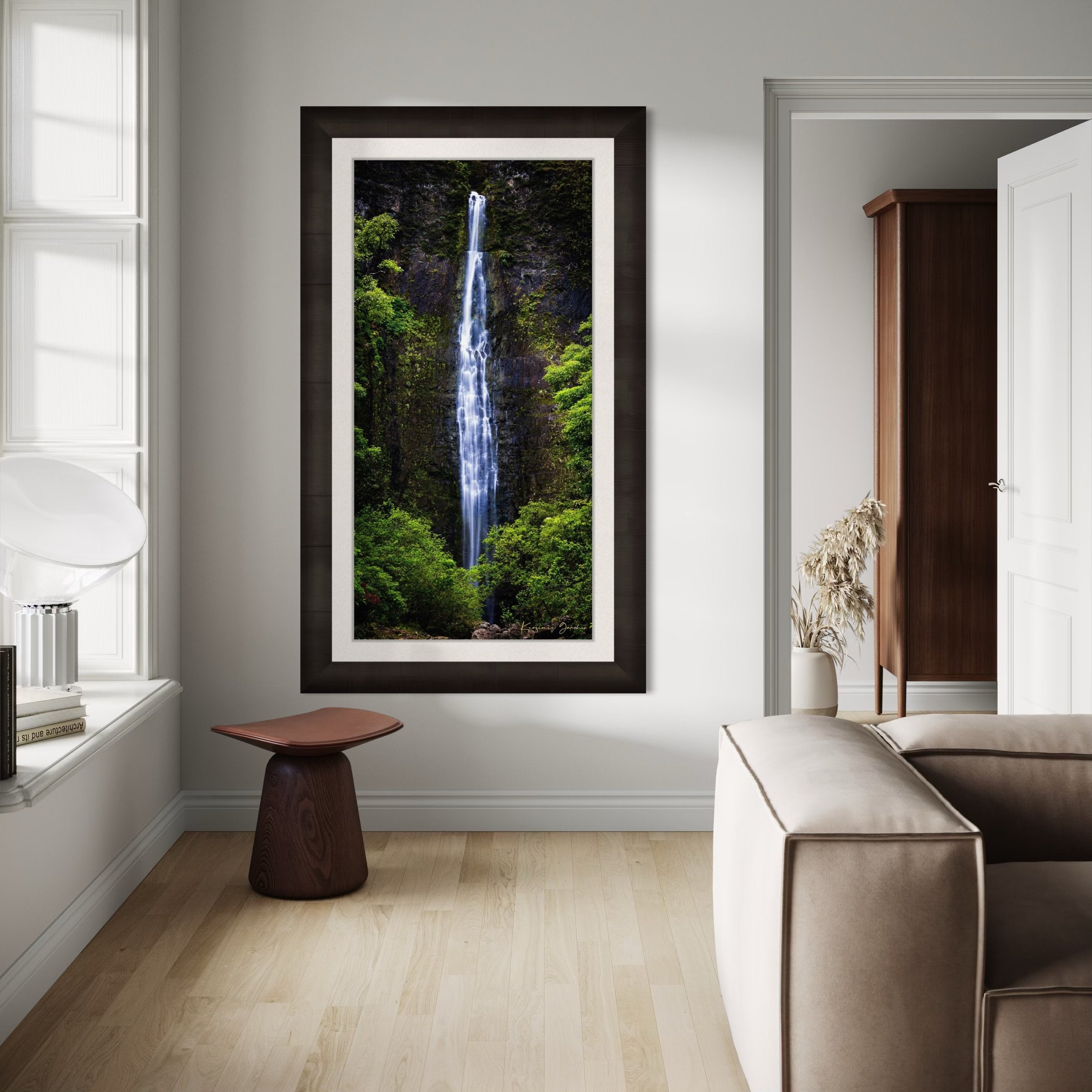Waterfall cascading down cliff face within Na Pali Coast region of Kauai under daylight conditions. #Finish_Roma Dark Ash Frame & Bright Liner
