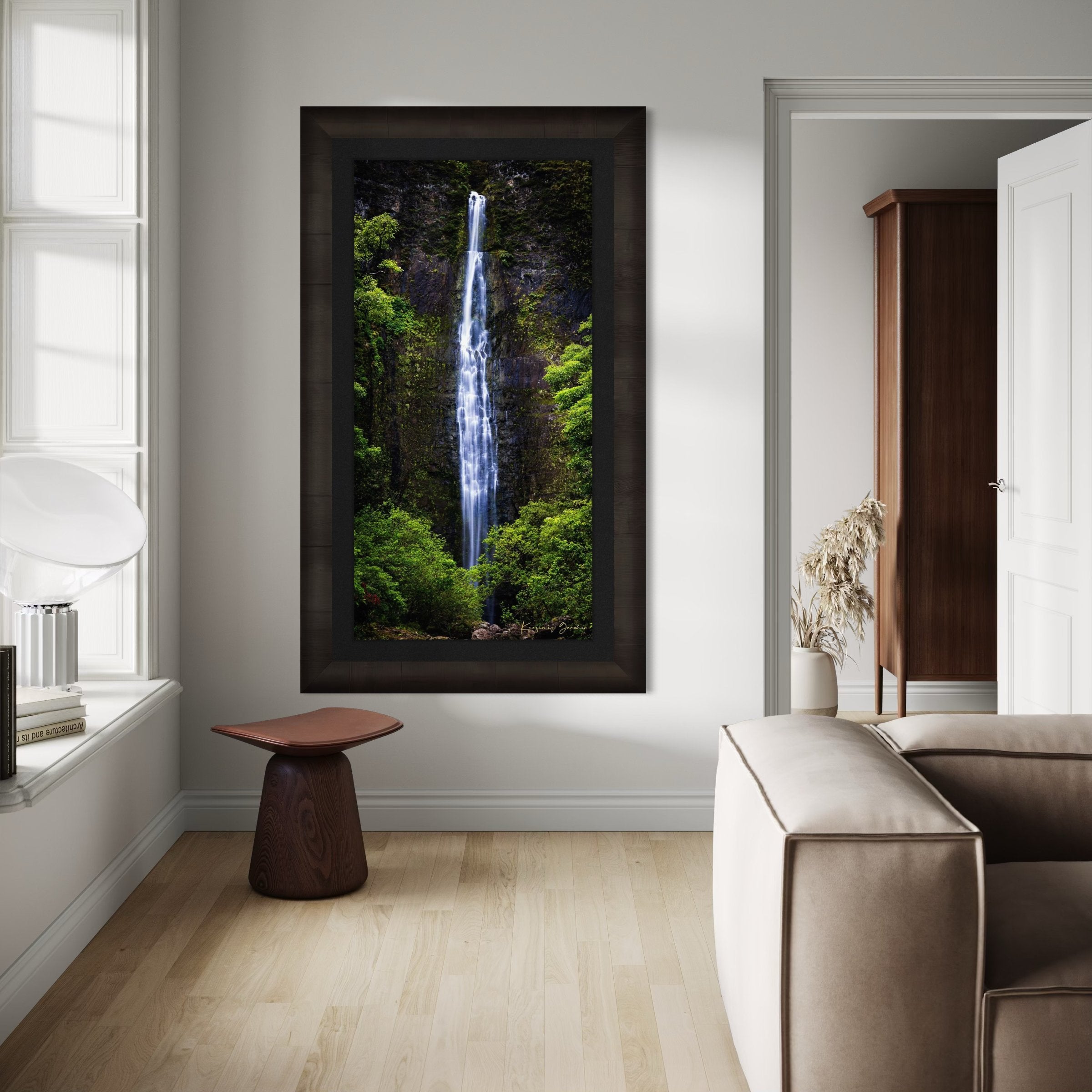 Waterfall cascading down cliff face within Na Pali Coast region of Kauai under daylight conditions. #Finish_Roma Dark Ash Frame & Dark Liner