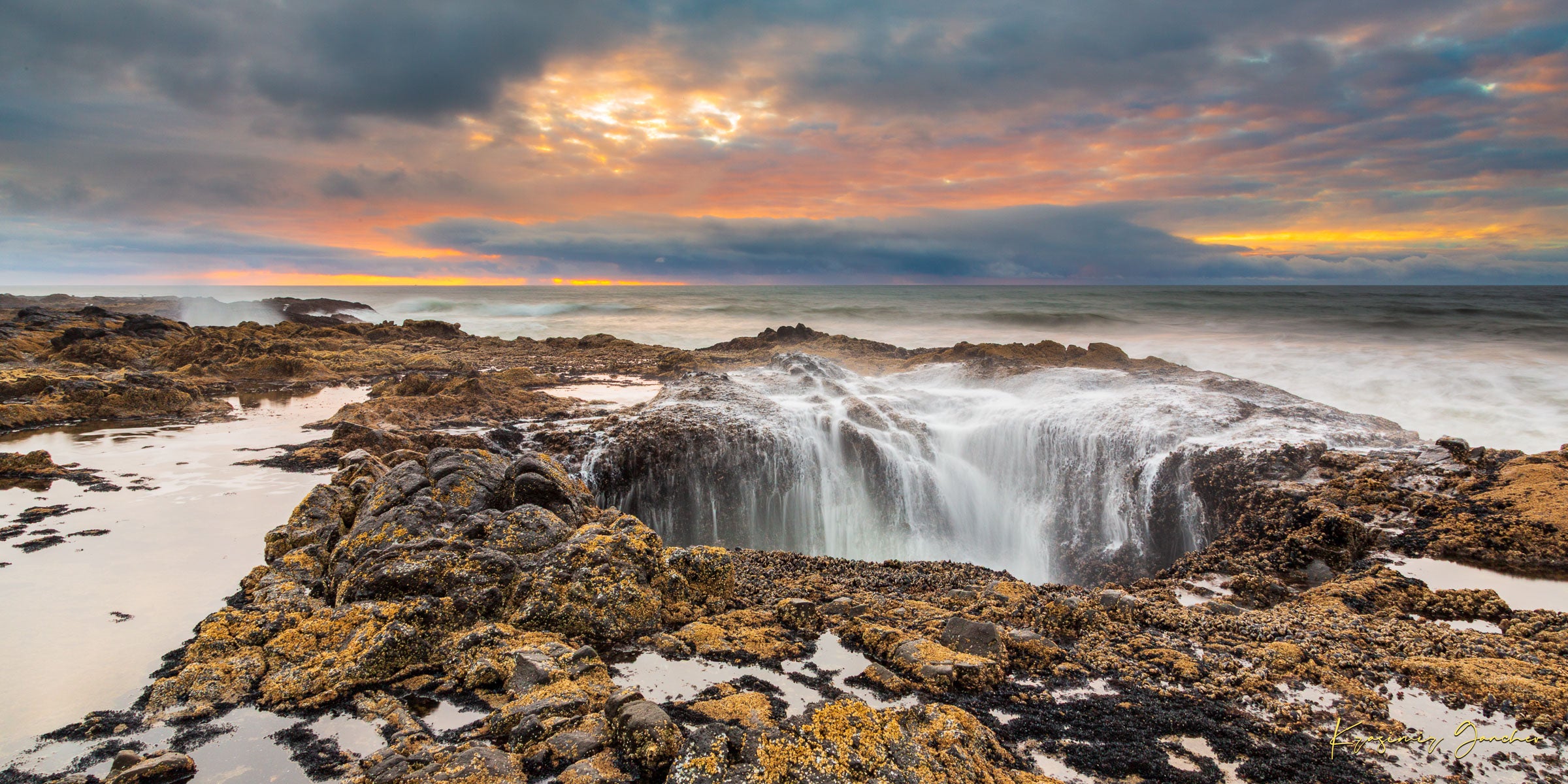 Ocean water surging into Thor's Well at the Oregon coastline during a sunlit evening with clouds and soft sky hues. #Finish_Acrylic Recess