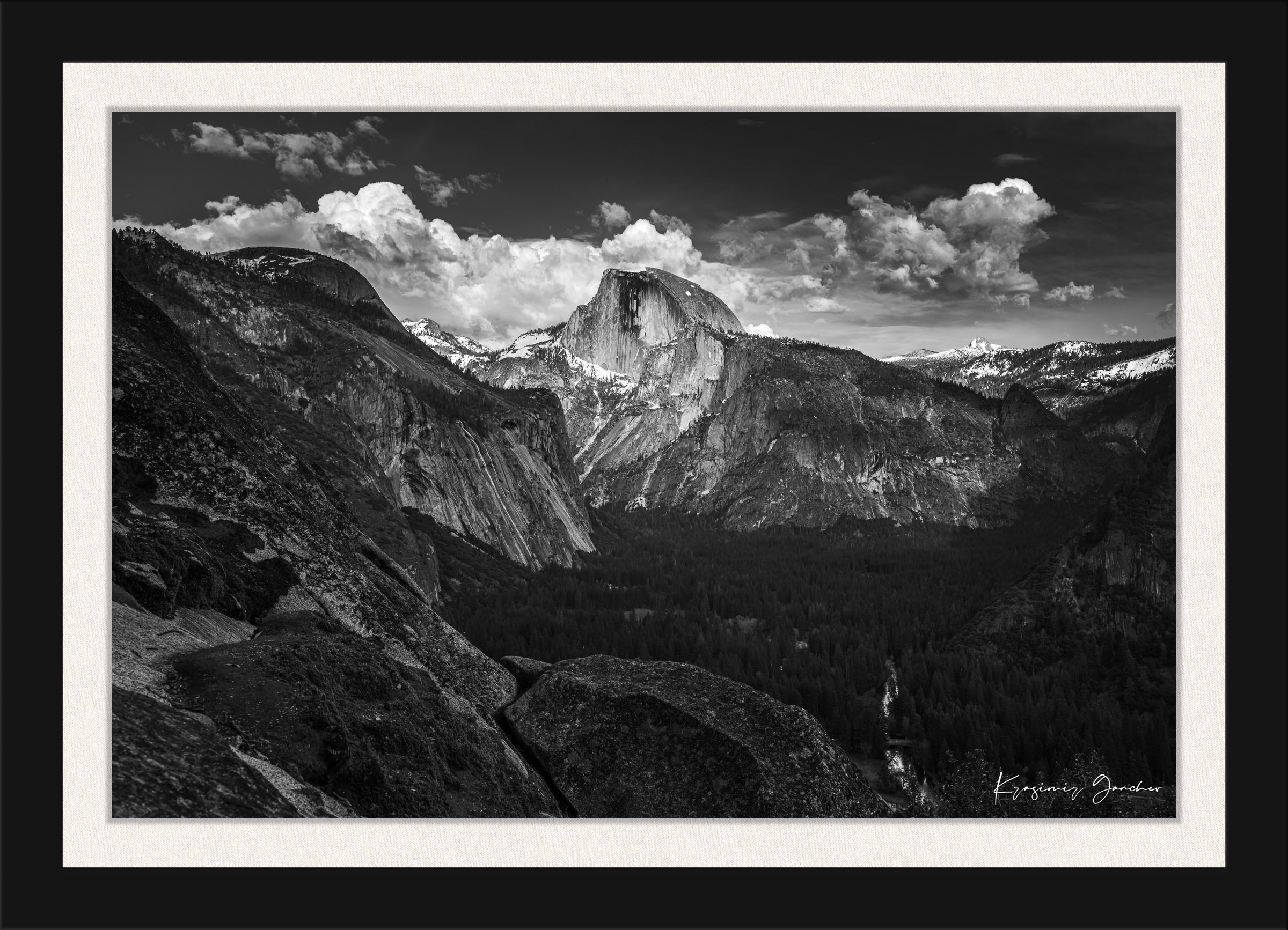Half Dome silhouetted against sunset sky with drifting clouds above Yosemite Valley. #Finish_Roma Satin Black Frame & Bright Liner