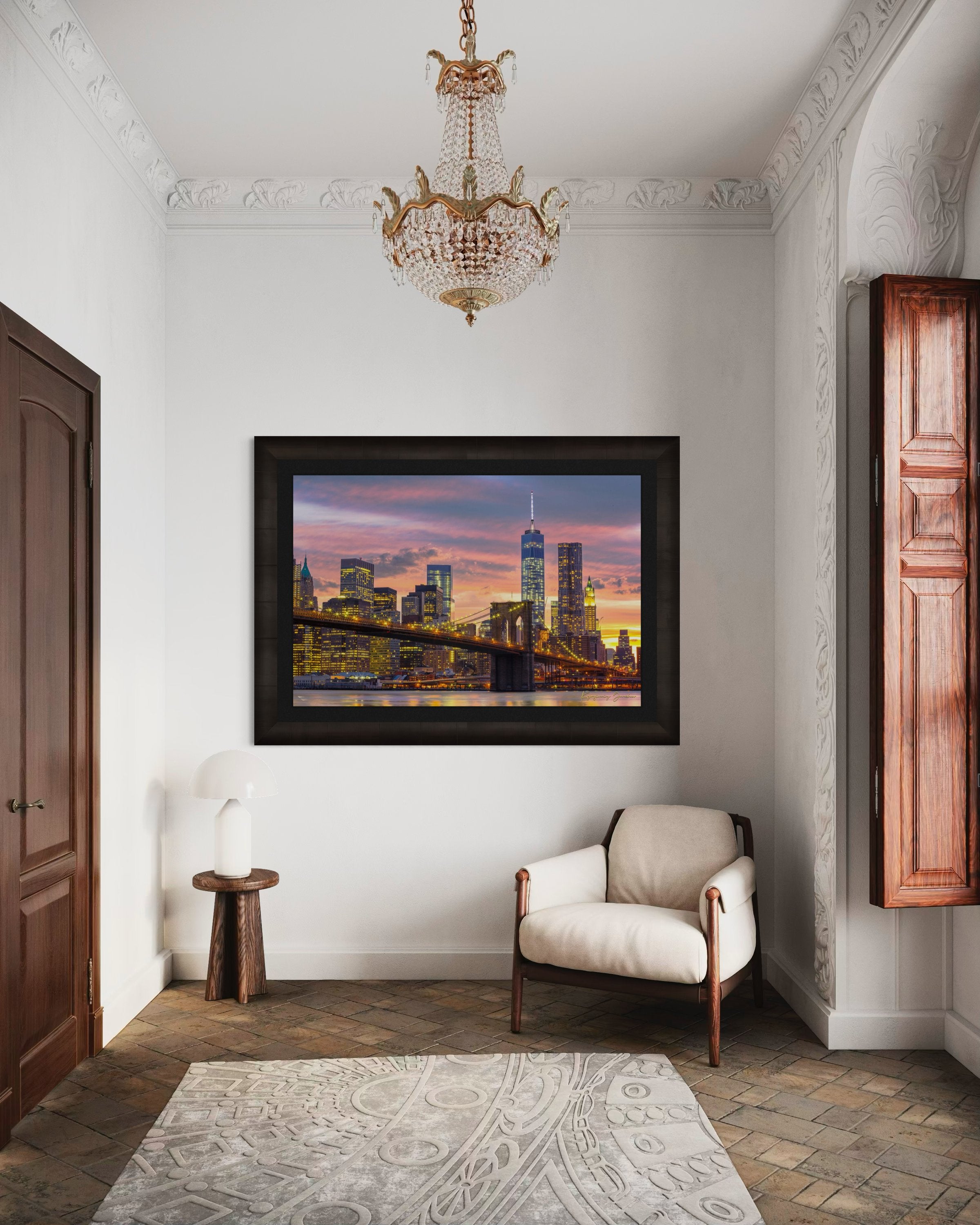 The Brooklyn Bridge viewed from Manhattan during evening hours as sunlight fades into artificial lighting under cloudy skies. #Finish_Roma Dark Ash Frame & Dark Liner