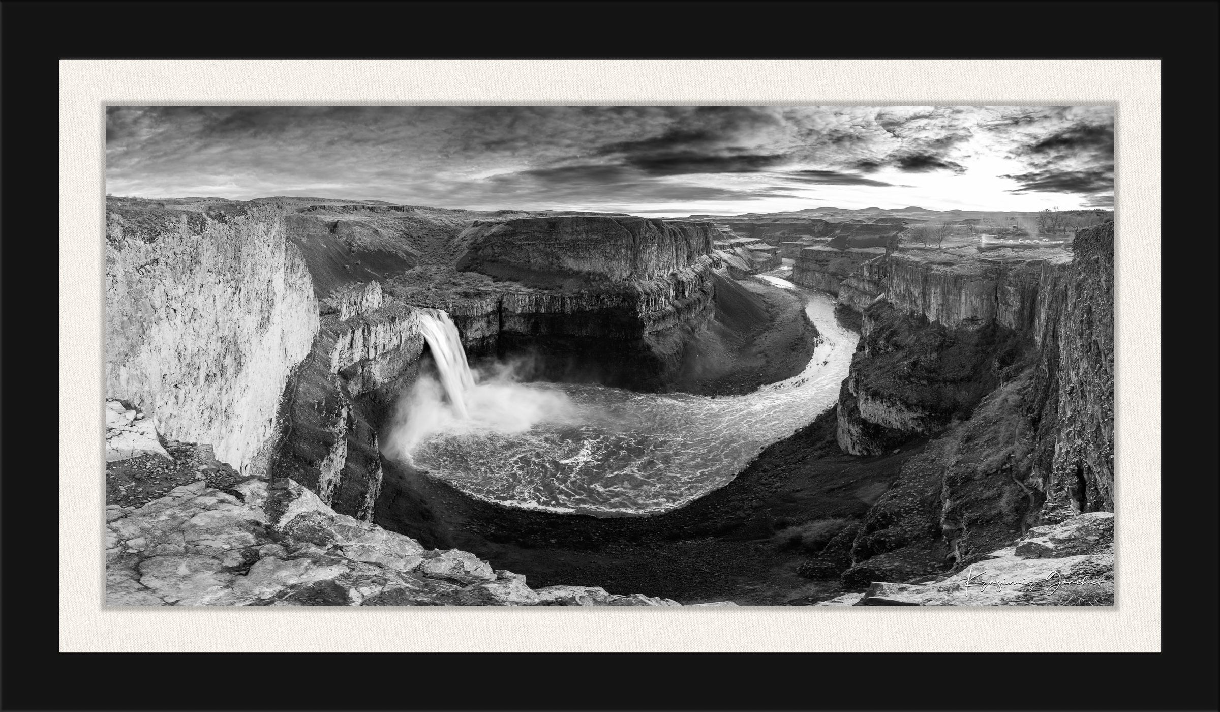 Wide-angle monochrome view of Palouse Falls in Washington State cascading into a rugged canyon with clouds above. #Finish_Roma Satin Black Frame & Bright Liner