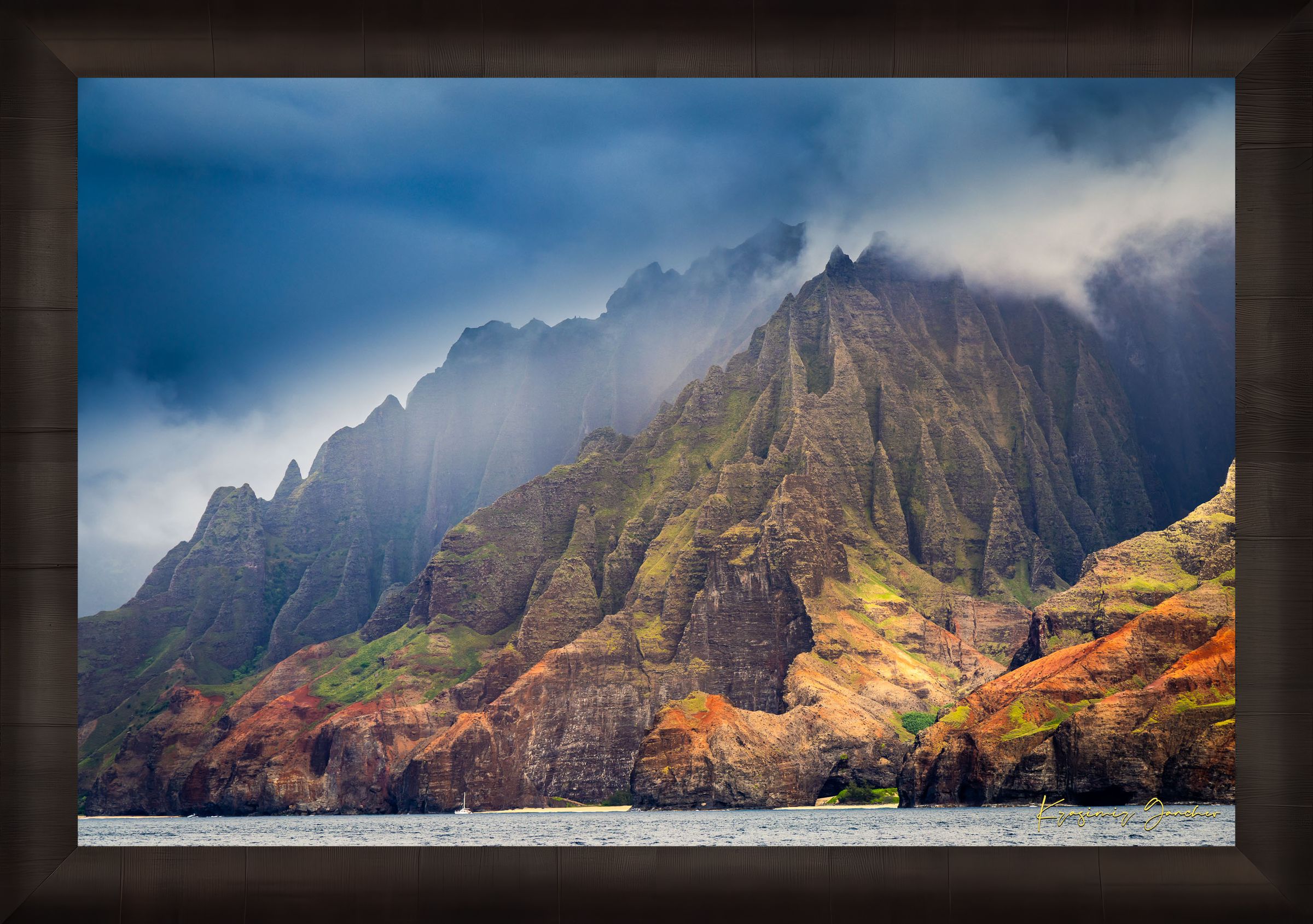 Rugged coastal cliff face rising from the Pacific Ocean at Napali Coast, Kauai, with light breaking through storm clouds. #Finish_Roma Dark Ash Frame