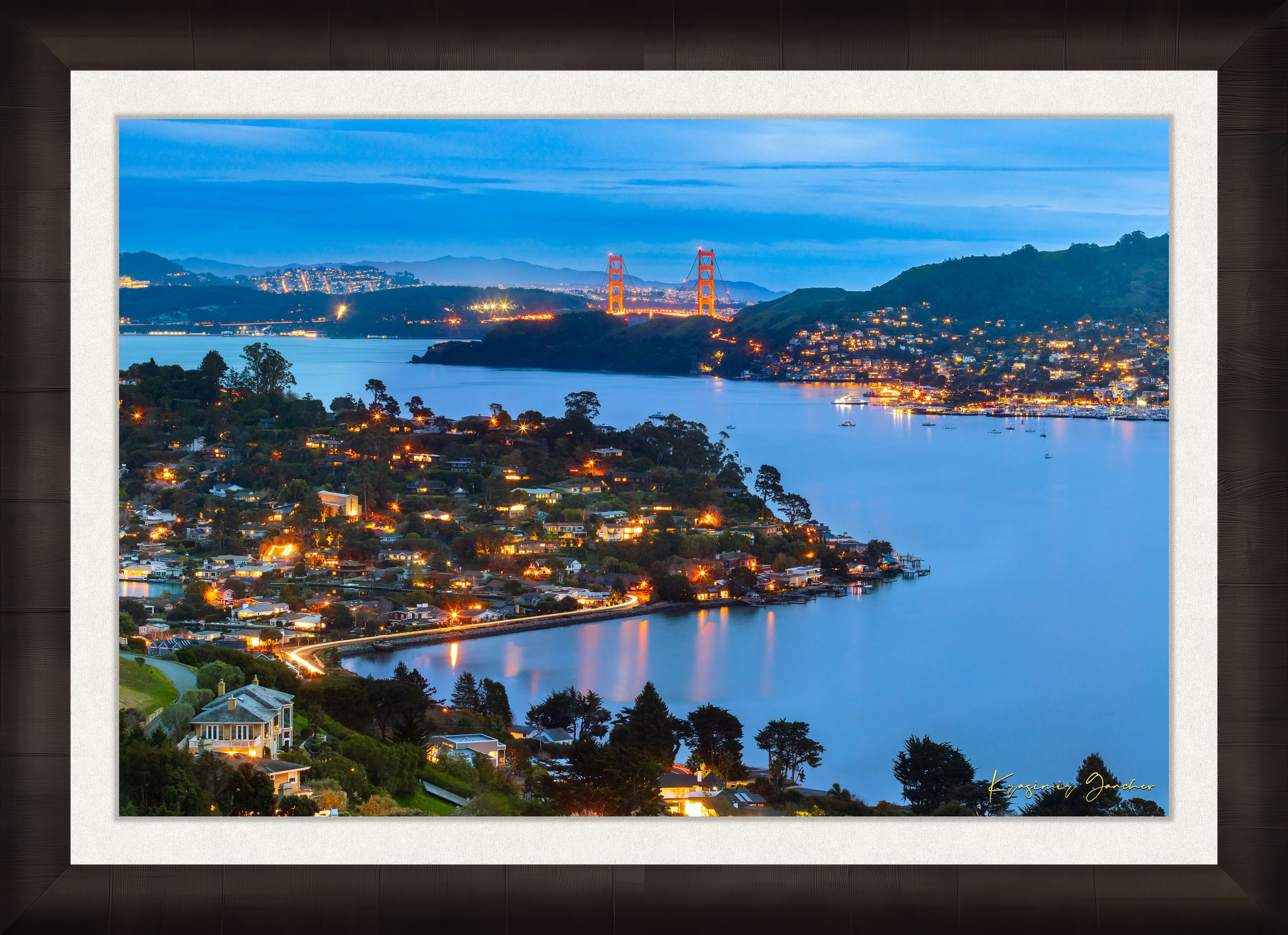 Long exposure of Golden Gate Bridge reflecting light across San Francisco Bay at dusk and night with cloud cover. #Finish_Roma Dark Ash Frame & Bright Liner