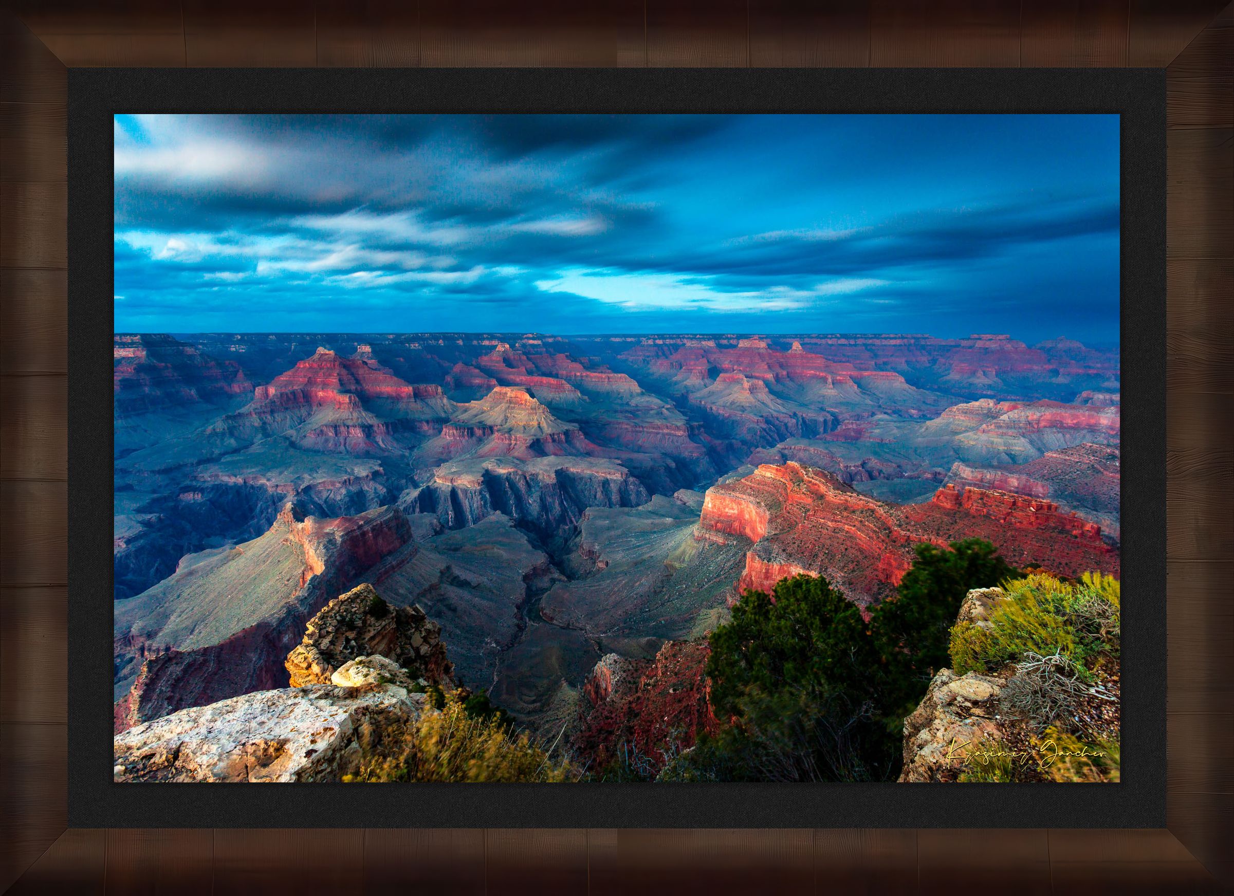 Grand Canyon under a dramatic sky at sunset, storm clouds gathering over the canyon rim during hazy weather. #Finish_Roma Cigar Leaf Frame & Dark Liner