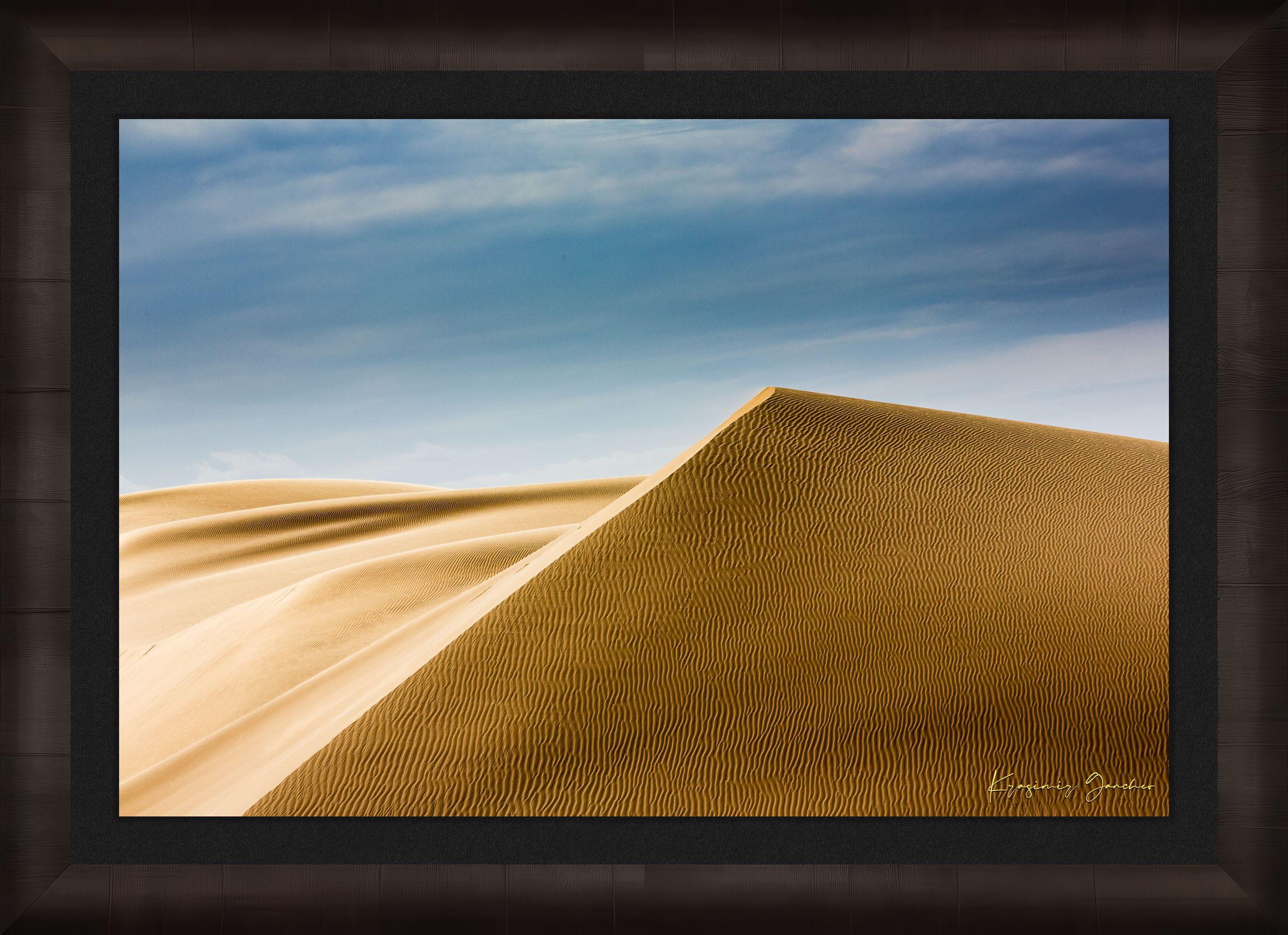 Expansive sand dune terrain at Brawley with subtle textures and color variations from natural sunlight. #Finish_Roma Dark Ash Frame & Dark Liner