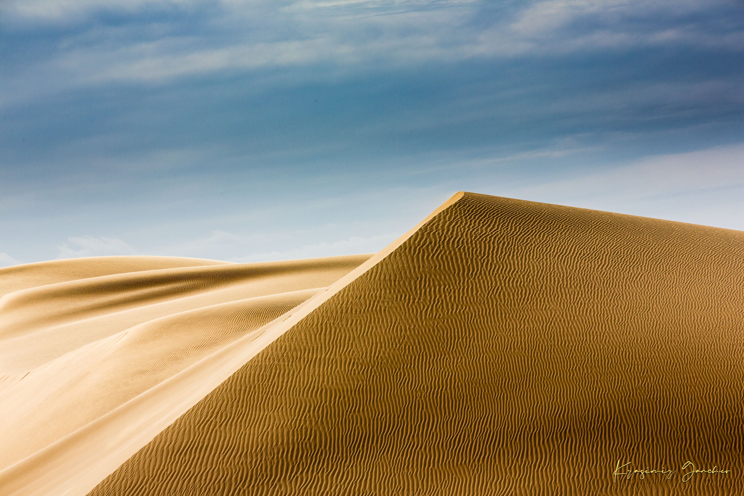 Expansive sand dune terrain at Brawley with subtle textures and color variations from natural sunlight. #Finish_Acrylic Recess