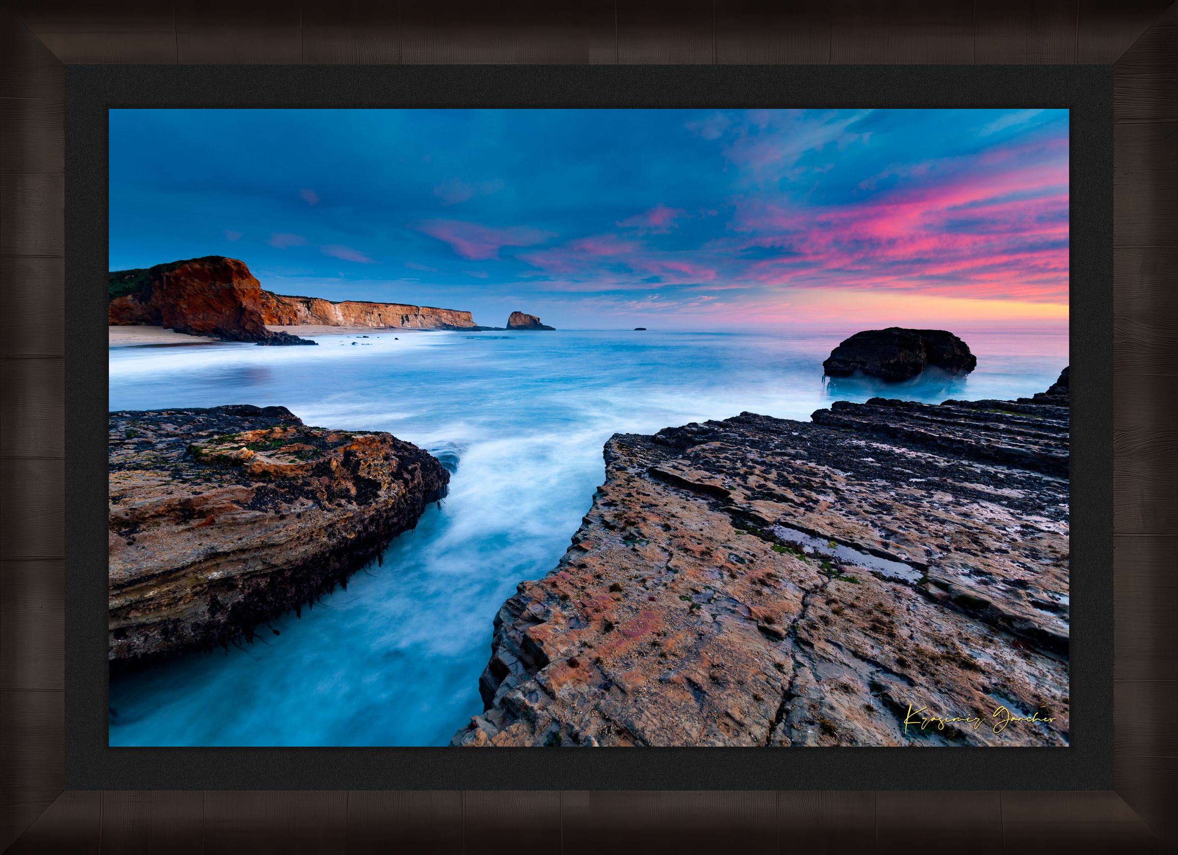 Sunset at Panther Beach, Santa Cruz featuring cliffs and waves beneath colorful clouds. #Finish_Roma Dark Ash Frame & Dark Liner