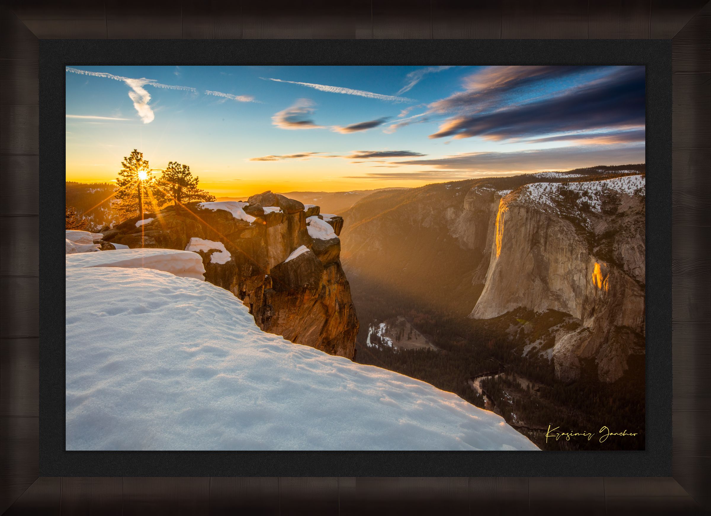 Alpine summit of El Capitan in Yosemite National Park at dawn, golden light through rock fissures over a snowfield. #Finish_Roma Dark Ash Frame & Dark Liner