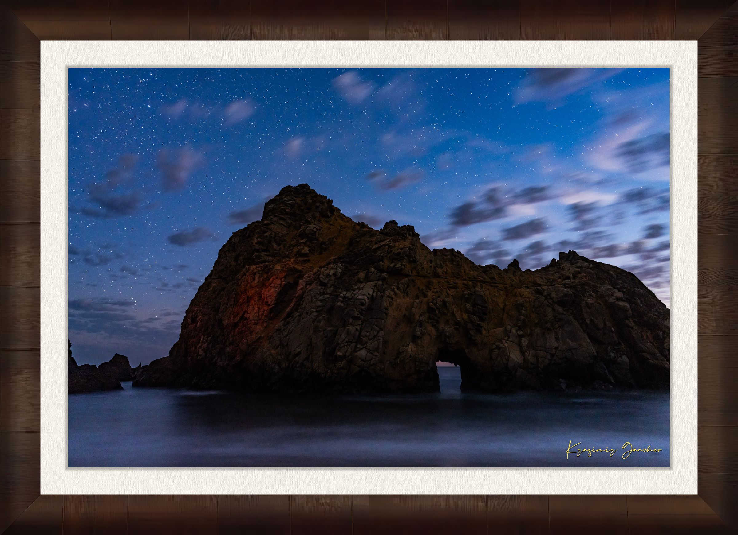 Keyhole Arch silhouette against a starry sky over the ocean at Pfeiffer Beach in Big Sur, California. #Finish_Roma Cigar Leaf Frame & Bright Liner