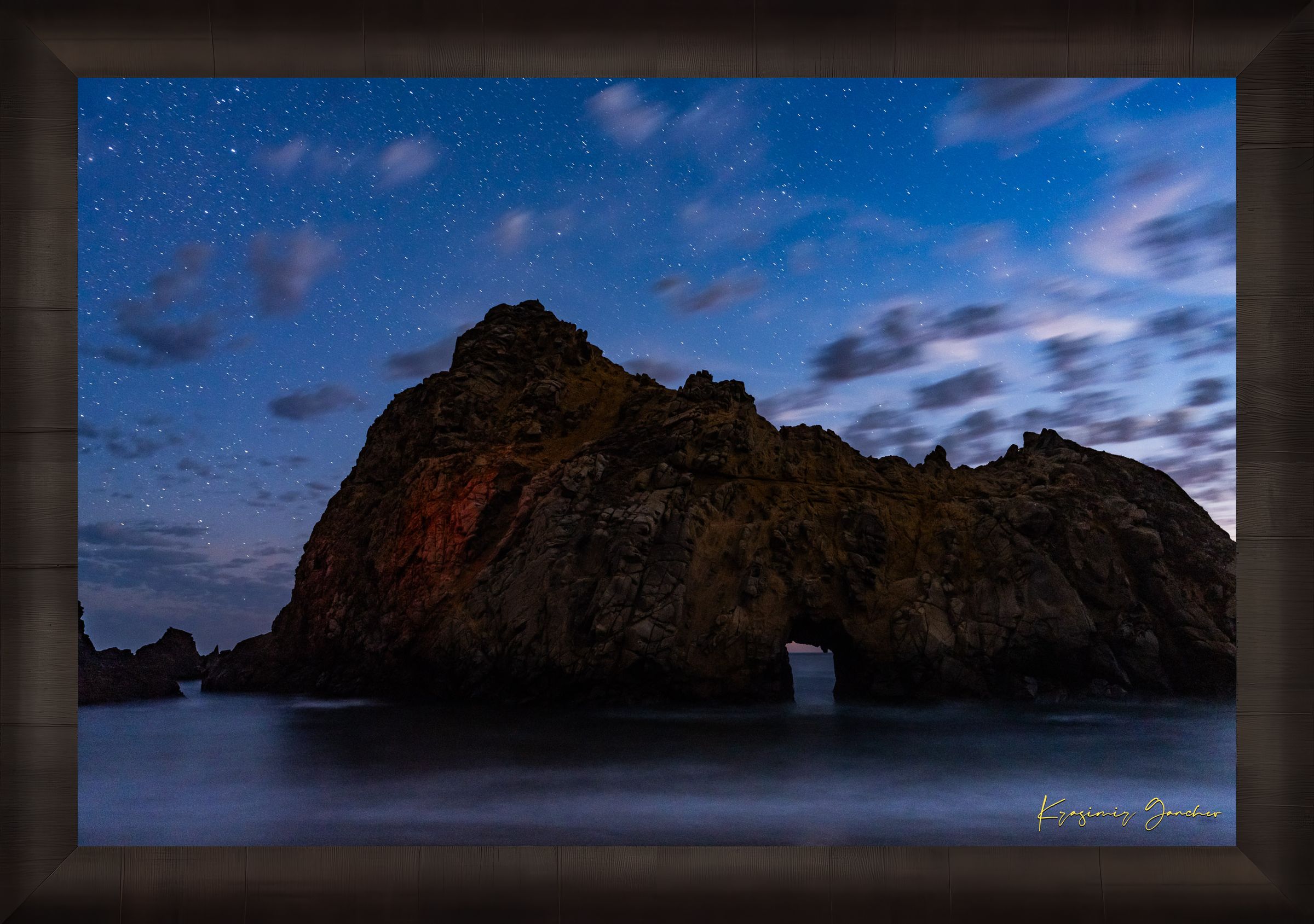 Keyhole Arch silhouette against a starry sky over the ocean at Pfeiffer Beach in Big Sur, California. #Finish_Roma Dark Ash Frame