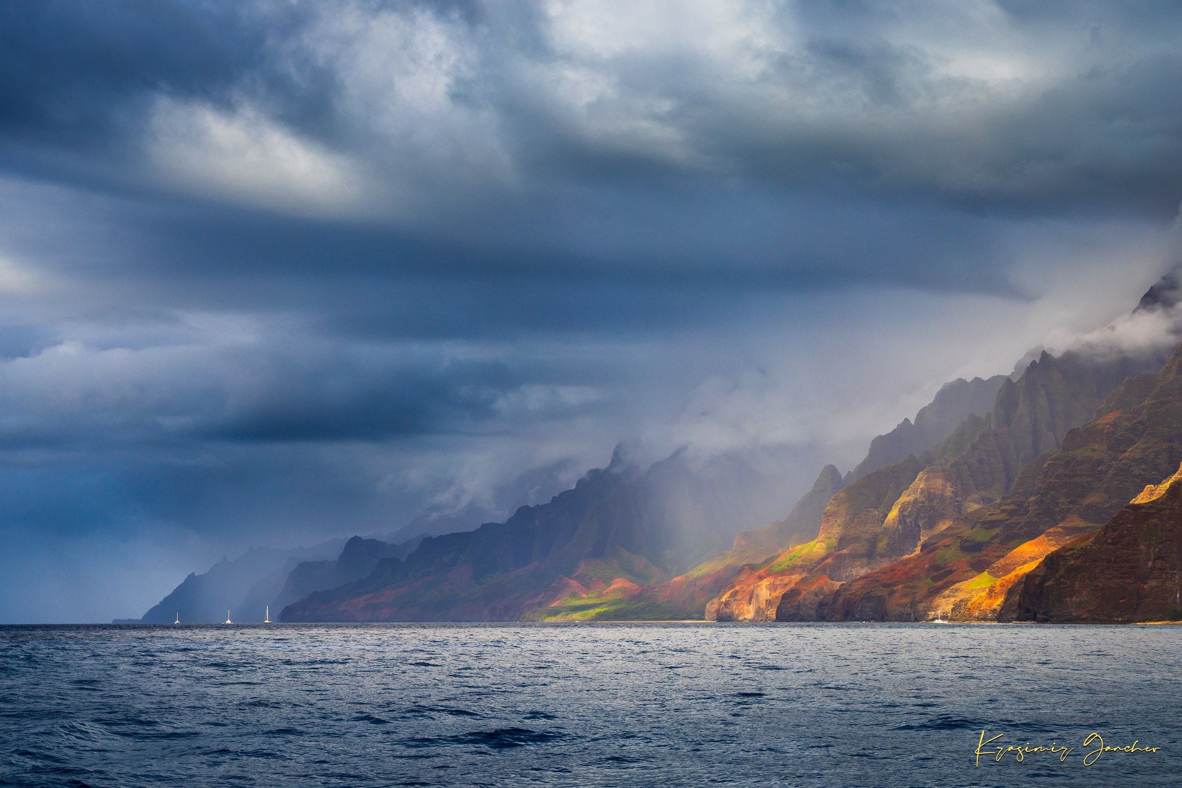 Cliffs and coastal terrain of Napali Coast, Kauai, under daylight with rain showers and cloud cover. #Finish_Acrylic Recess