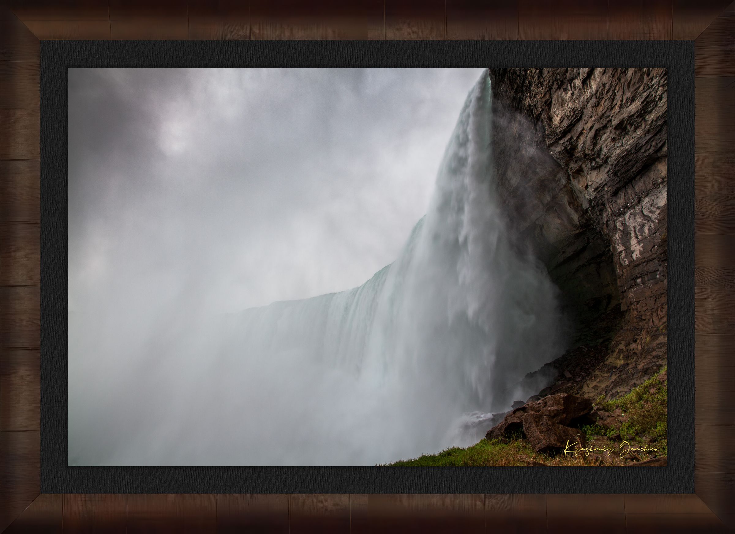 Waterfall descending from cliff edge at Niagara Falls, surrounded by mist and storm clouds. #Finish_Roma Cigar Leaf Frame & Dark Liner
