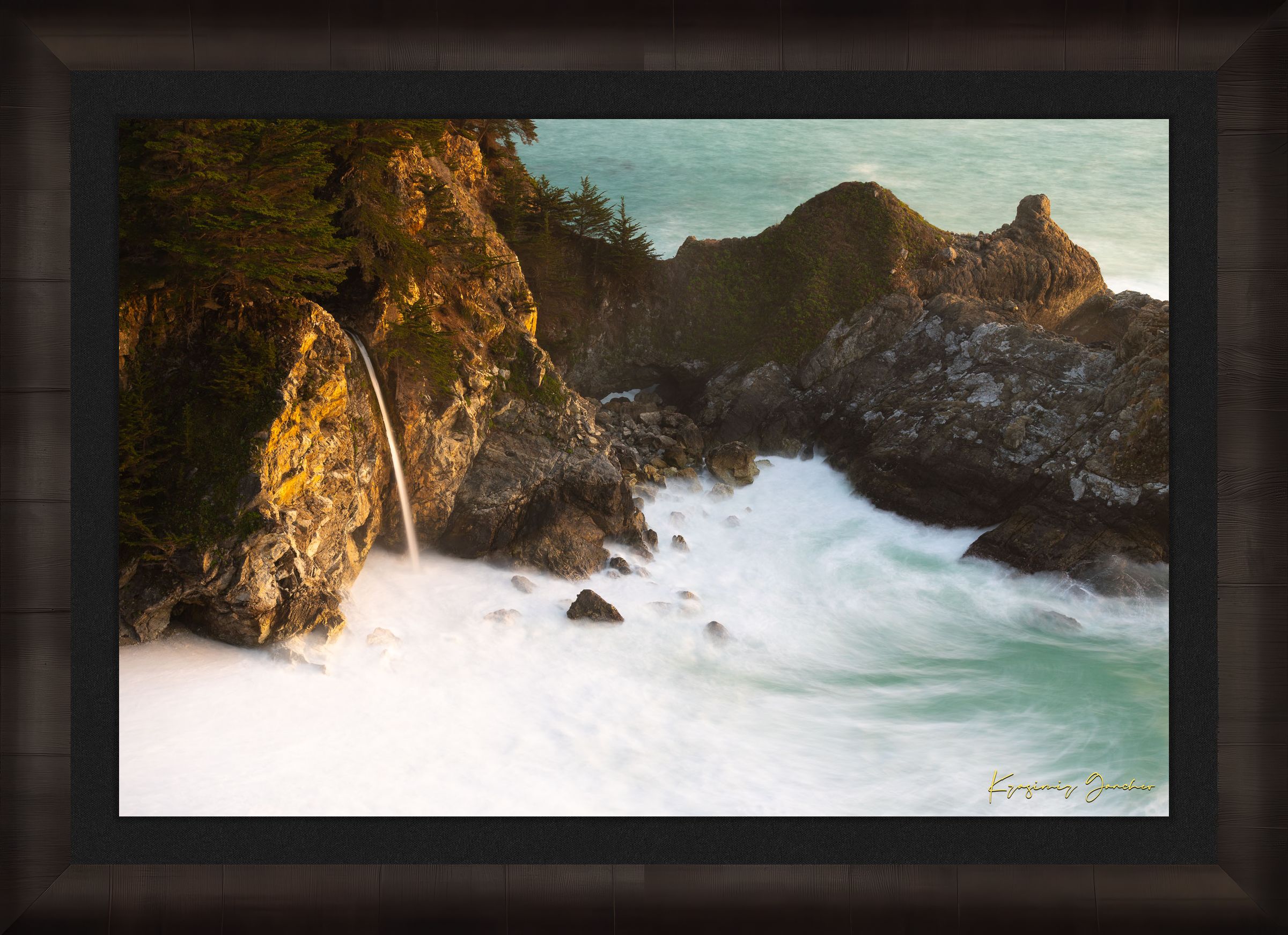 McWay Falls flows from a cliff onto a beach in Big Sur, captured during sunset with the Pacific Ocean visible. #Finish_Roma Dark Ash Frame & Dark Liner