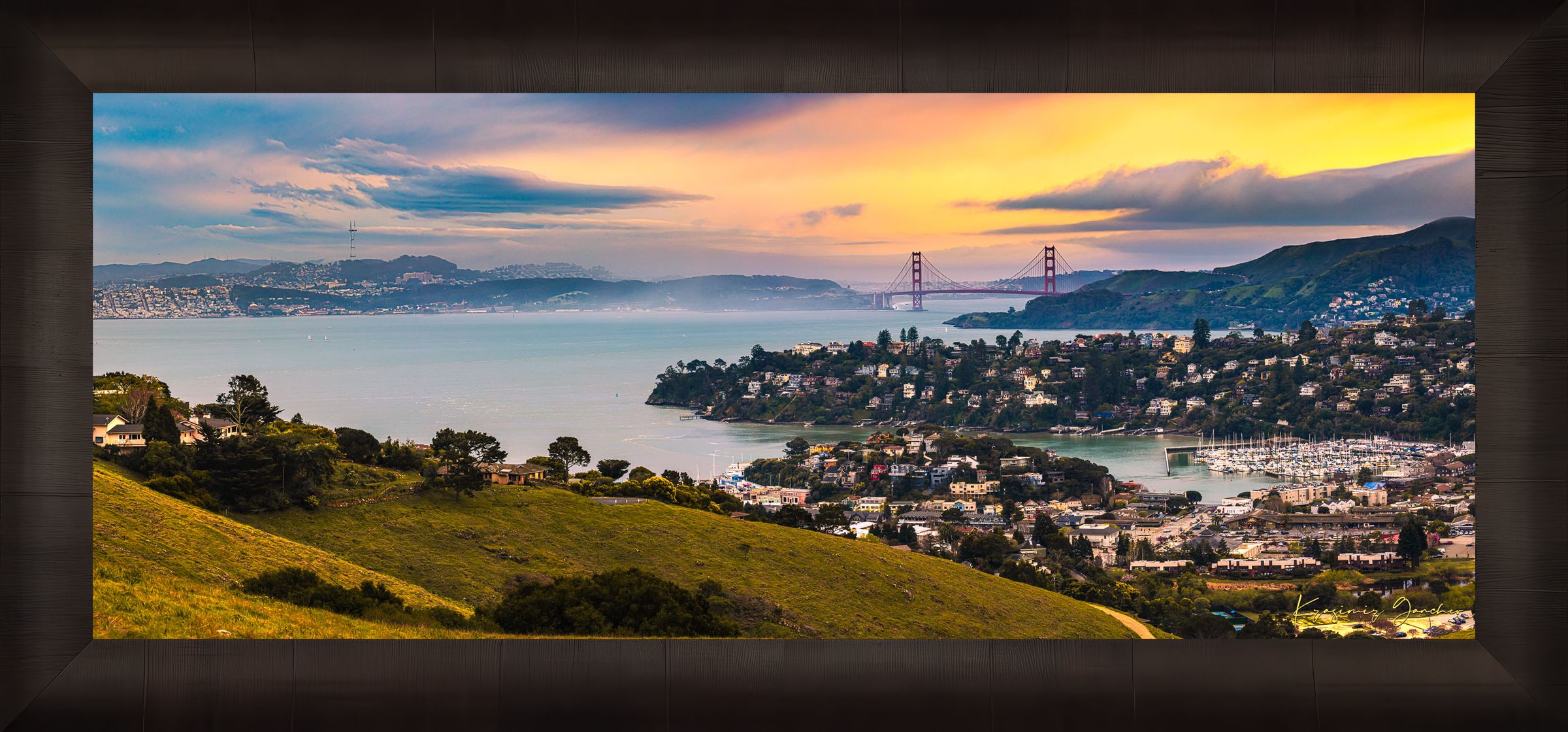 Golden Gate Bridge illuminated at sunset above the San Francisco Bay, showing light trails and cloudy skies with Tiburon in foreground. #Finish_Roma Dark Ash Frame
