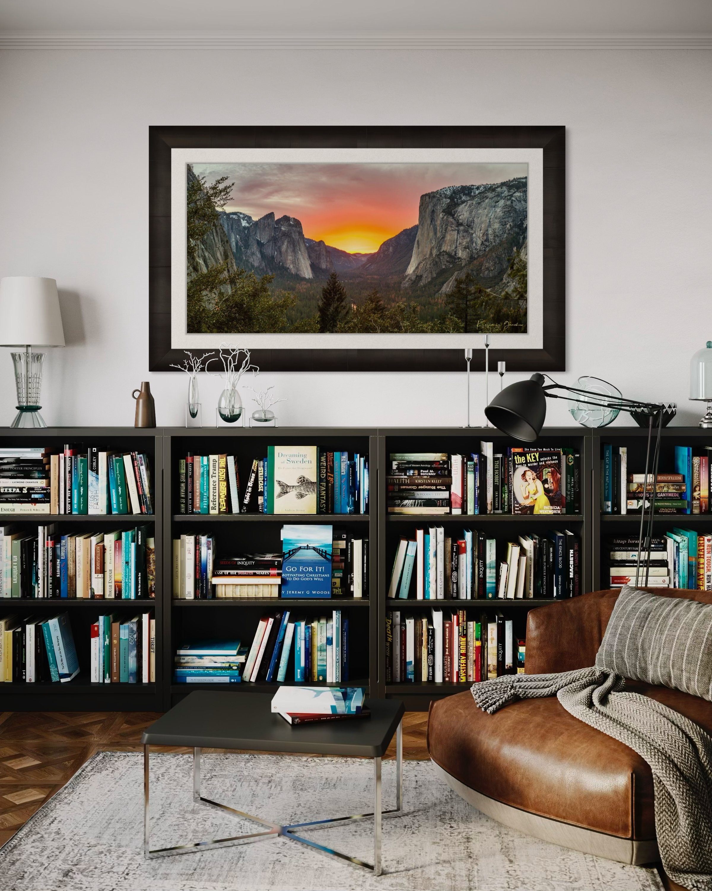 El Capitan monolith in Yosemite Valley at sunset, cloud layers glowing softly under golden light. #Finish_Roma Dark Ash Frame & Bright Liner