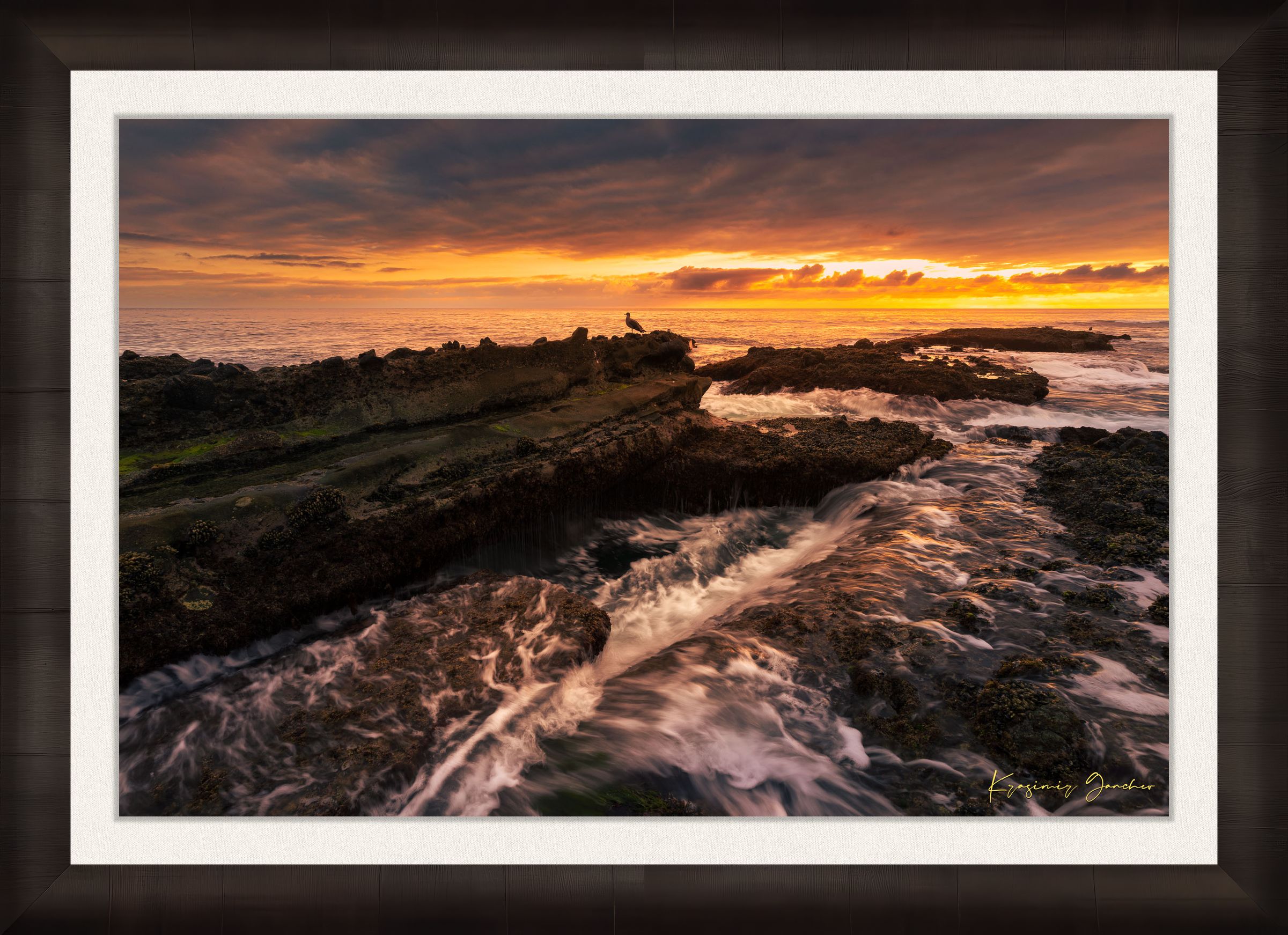 Ocean view at Woods Cove, Laguna Beach during sunset showing wave motion on coastal tide flats under a clouded sky. #Finish_Roma Dark Ash Frame & Bright Liner