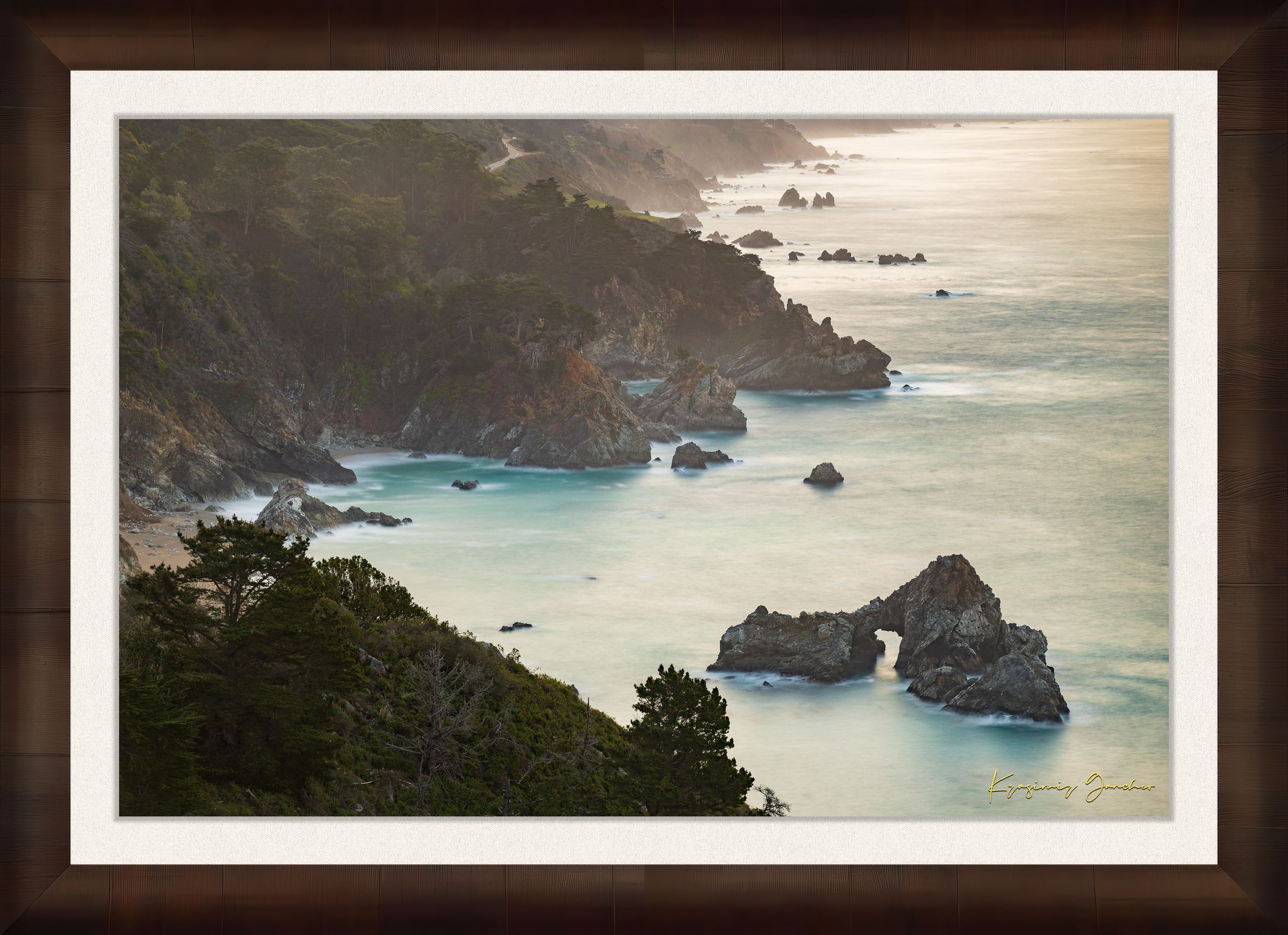 Coastal rock formation known as McWay Rocks at dawn on the Big Sur coastline with lush vegetation and ocean view. #Finish_Roma Cigar Leaf Frame & Bright Liner
