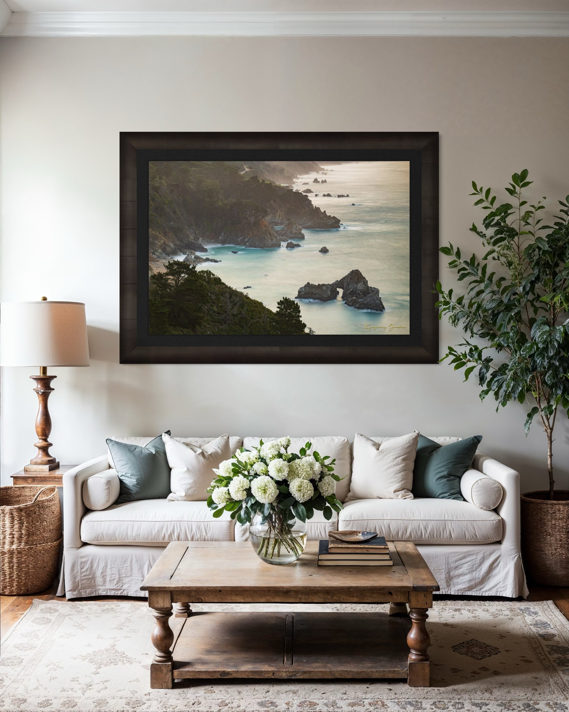 Coastal rock formation known as McWay Rocks at dawn on the Big Sur coastline with lush vegetation and ocean view. #Finish_Roma Dark Ash Frame & Dark Liner