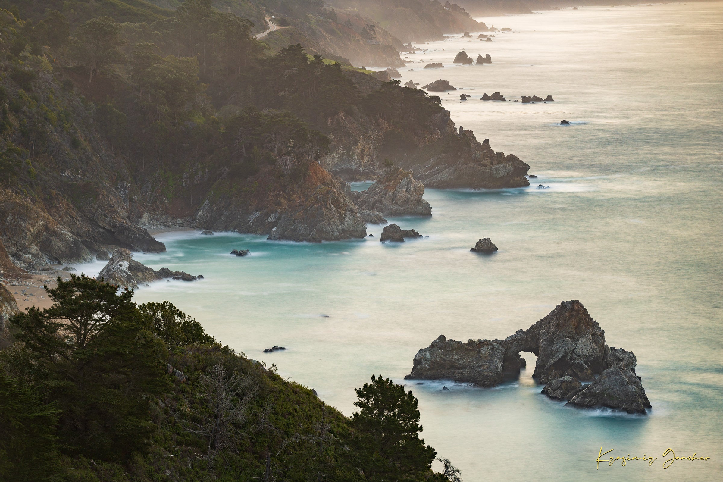Coastal rock formation known as McWay Rocks at dawn on the Big Sur coastline with lush vegetation and ocean view. #Finish_Acrylic Recess