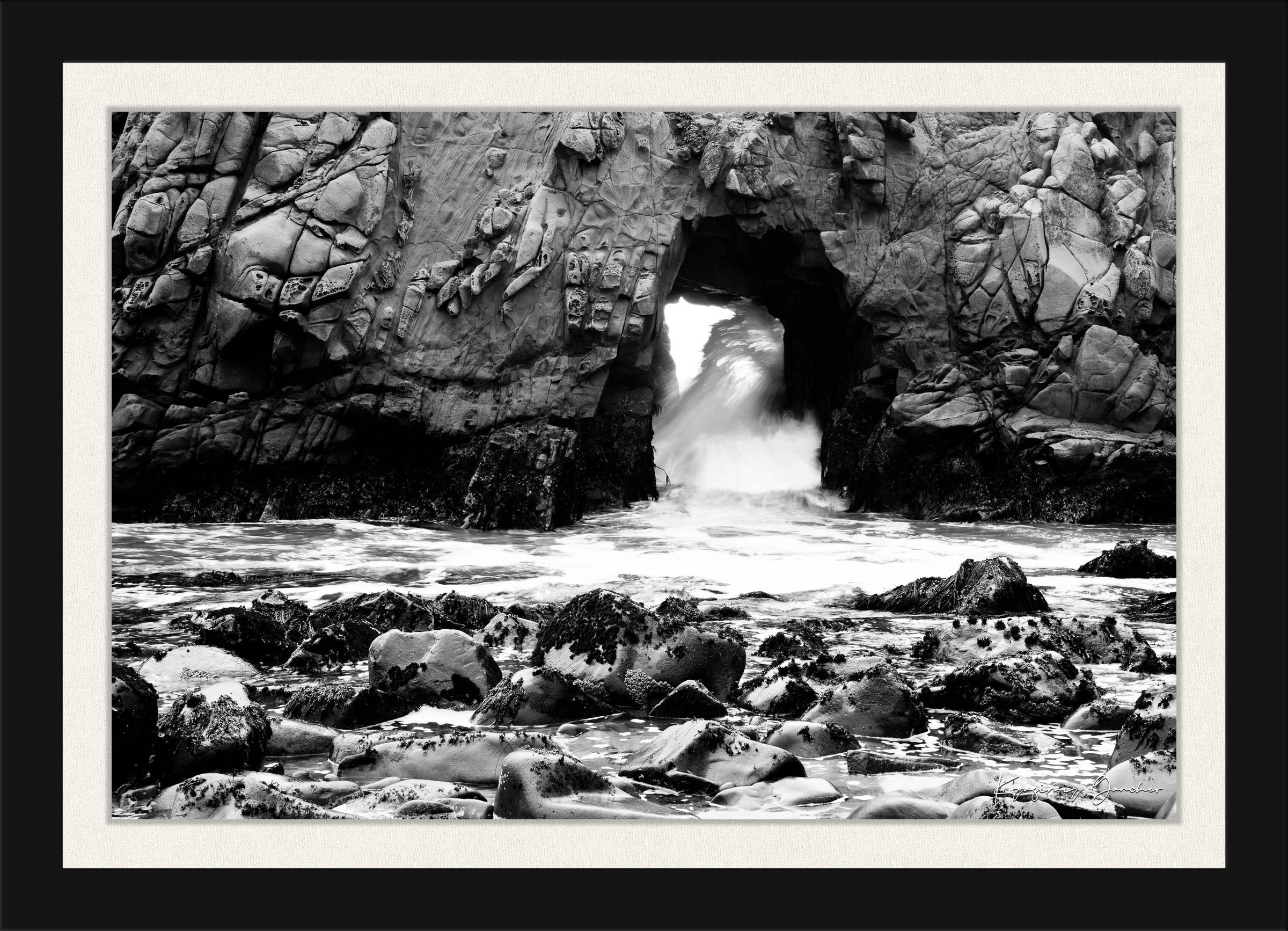 Natural arch formation at Big Sur viewed during daylight, facing the ocean with wave motion. #Finish_Roma Satin Black Frame & Bright Liner
