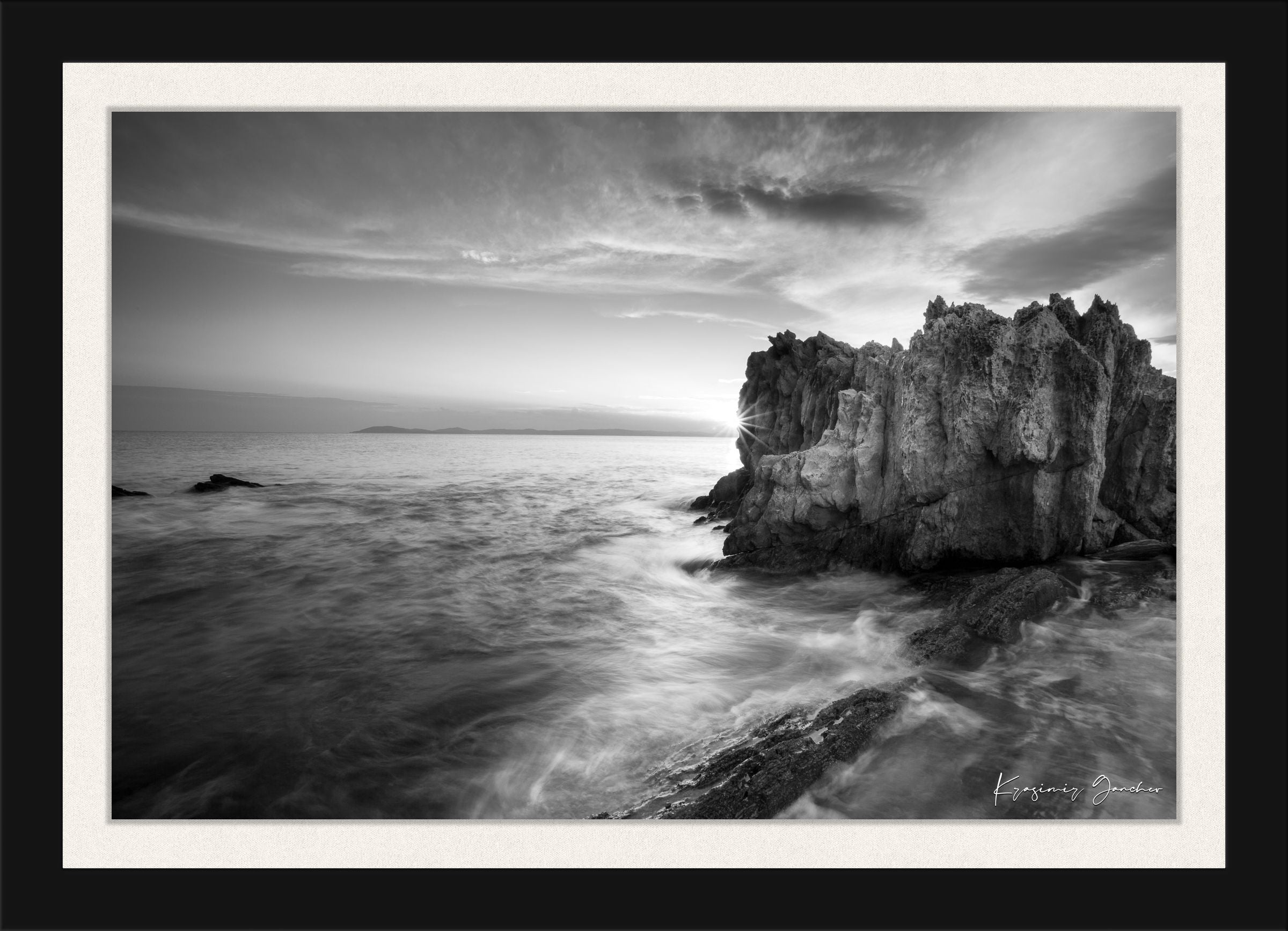 Black and white photograph of Sithonia’s rugged coastal cliffs during sunset, high contrast with breaking waves. #Finish_Roma Satin Black Frame & Bright Liner