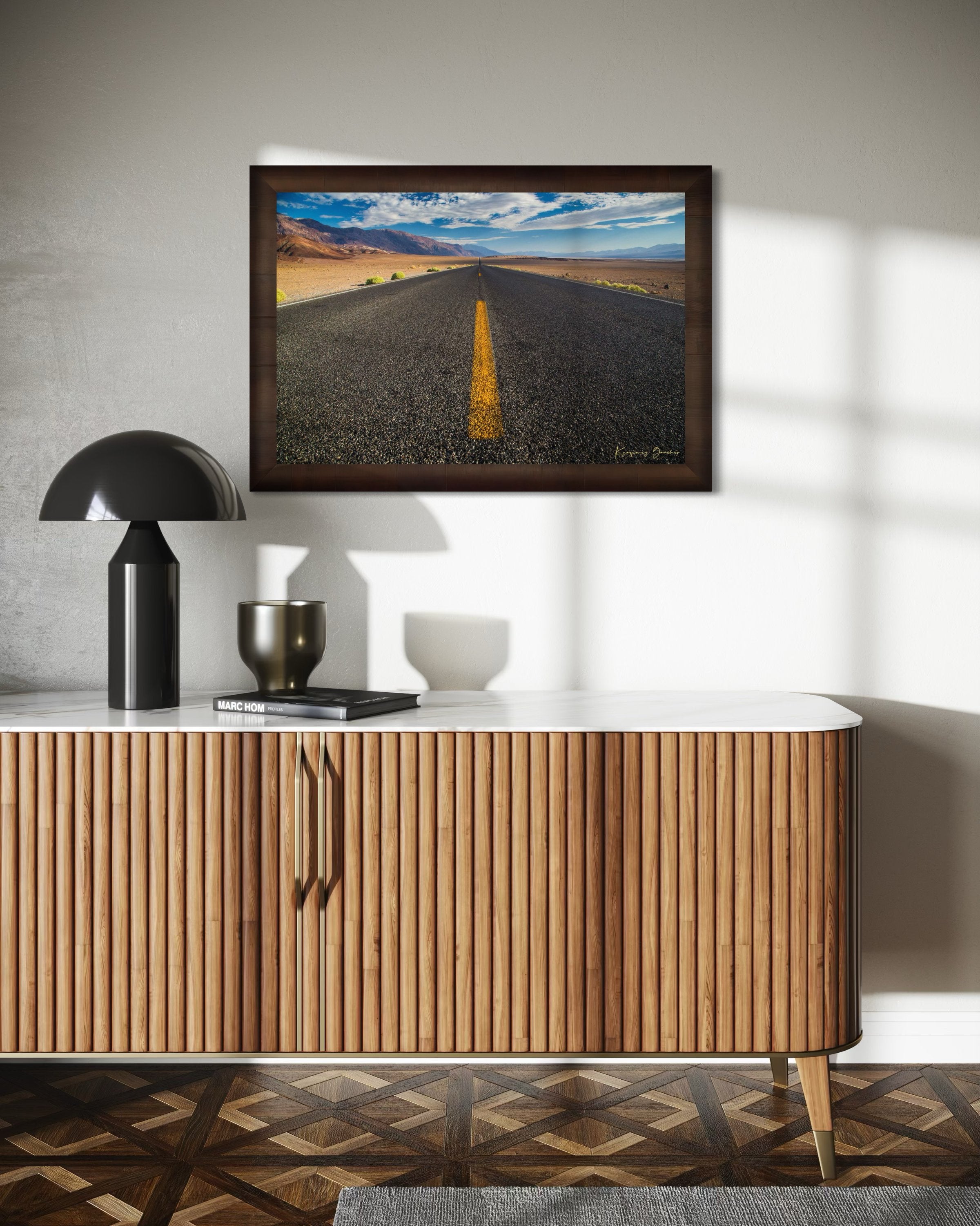 Straight desert road stretching into an open landscape of arid terrain in Death Valley National Park under overcast skies. #Finish_Roma Cigar Leaf Frame