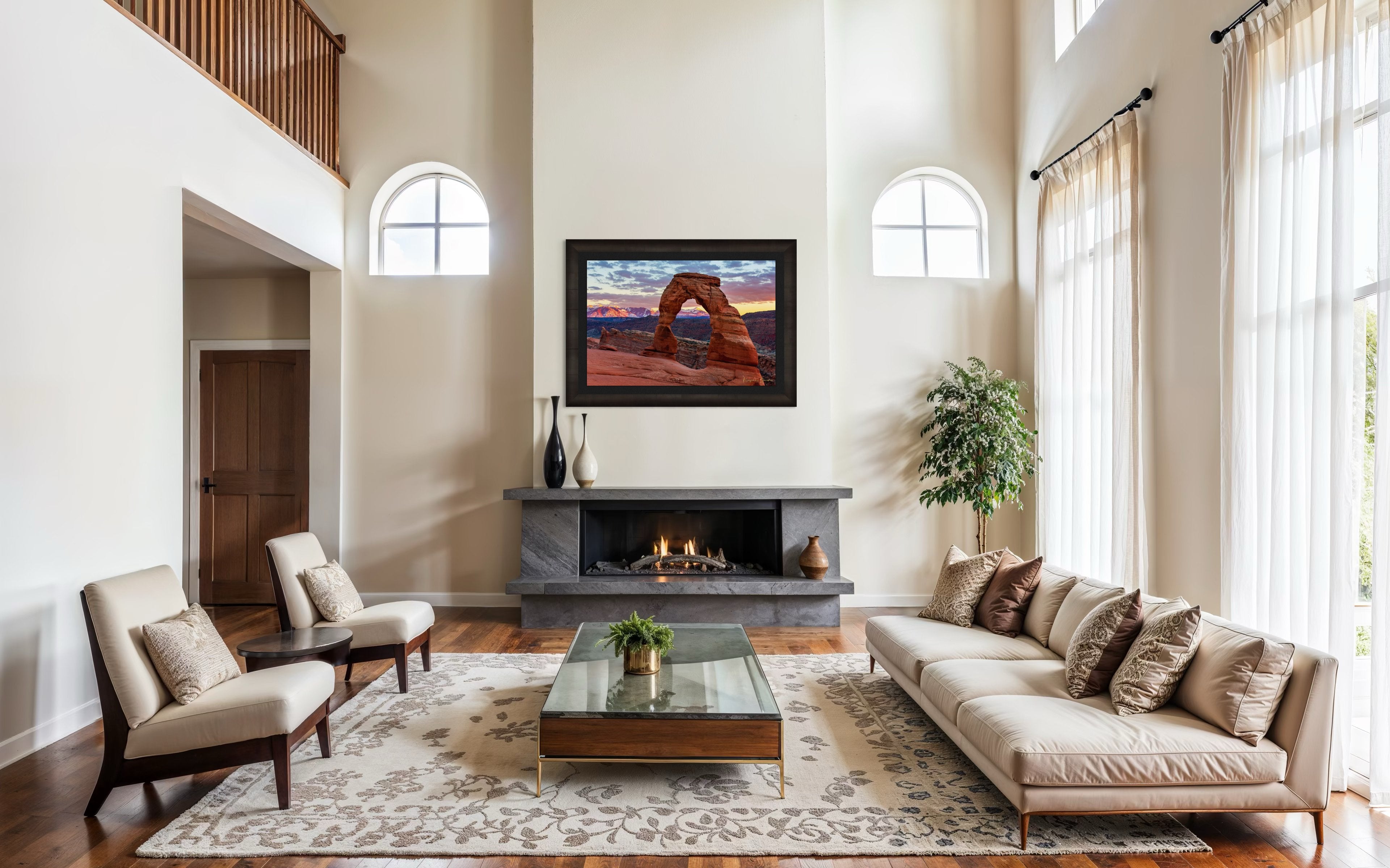 Natural arch of Delicate Arch in Arches National Park illuminated by sunset glow against a cloudy sky with vibrant reds and purples. #Finish_Roma Dark Ash Frame & Dark Liner