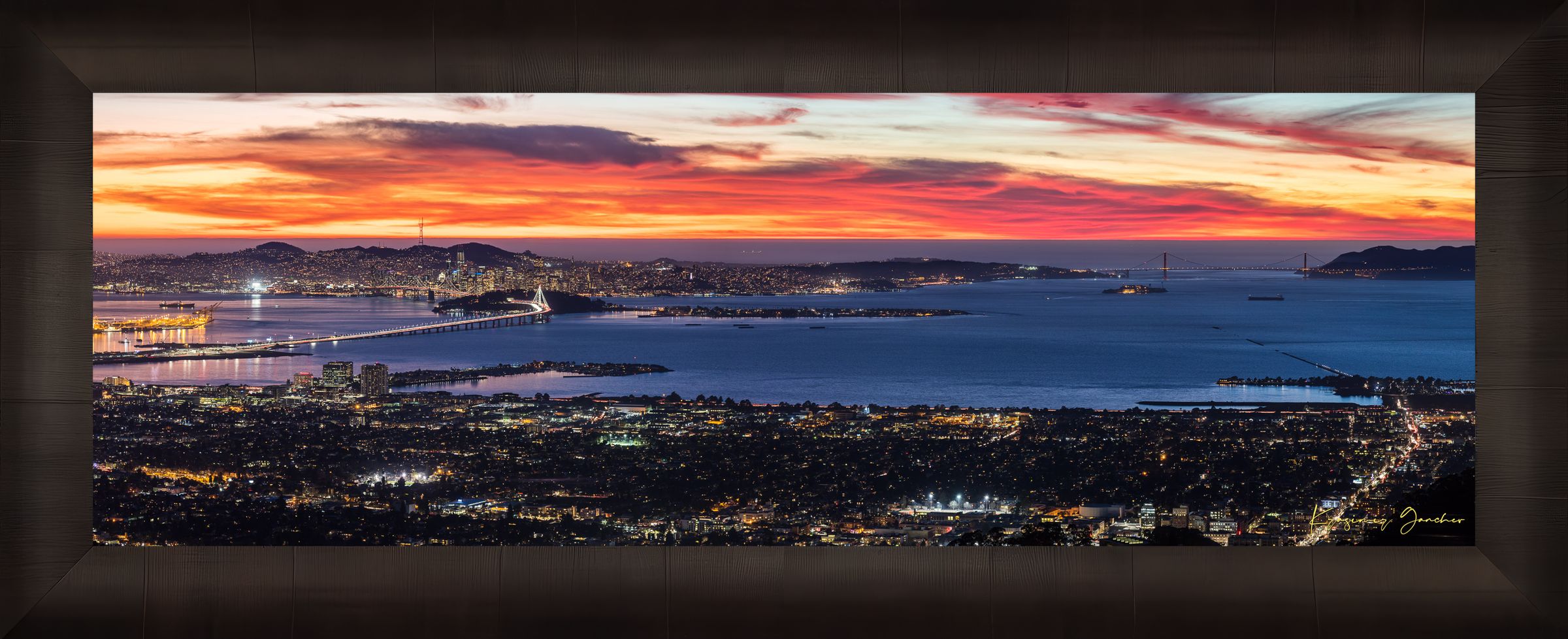 Wide-angle view of San Francisco’s Bay Bridge lit by dusk, urban grid patterns reflecting across the bay under cloudy skies. #Finish_Roma Dark Ash Frame