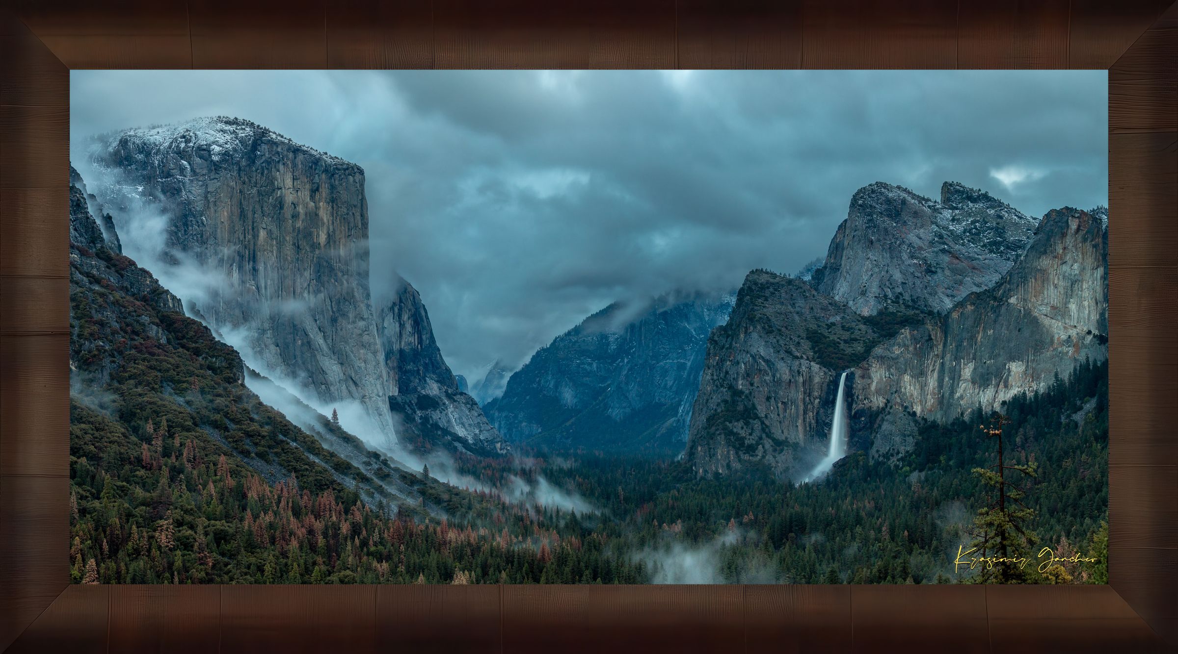 Bridalveil Falls surrounded by mist and clouds in Yosemite Valley during twilight, shadowed monoliths visible. #Finish_Roma Cigar Leaf Frame
