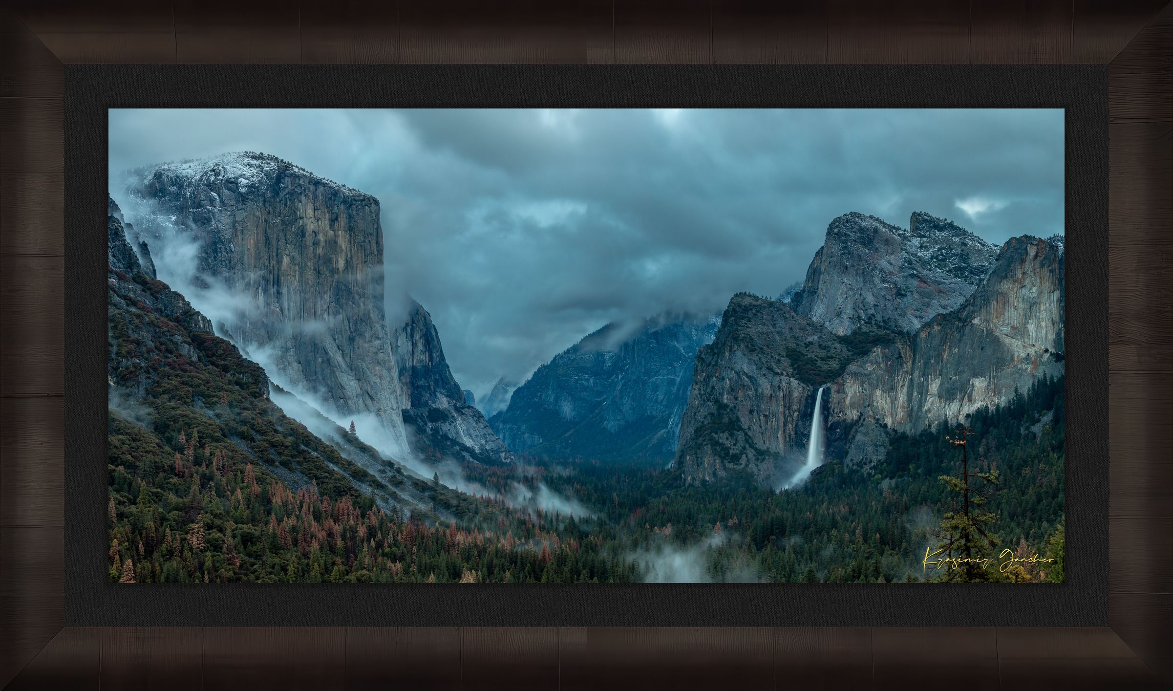 Bridalveil Falls surrounded by mist and clouds in Yosemite Valley during twilight, shadowed monoliths visible. #Finish_Roma Dark Ash Frame & Dark Liner