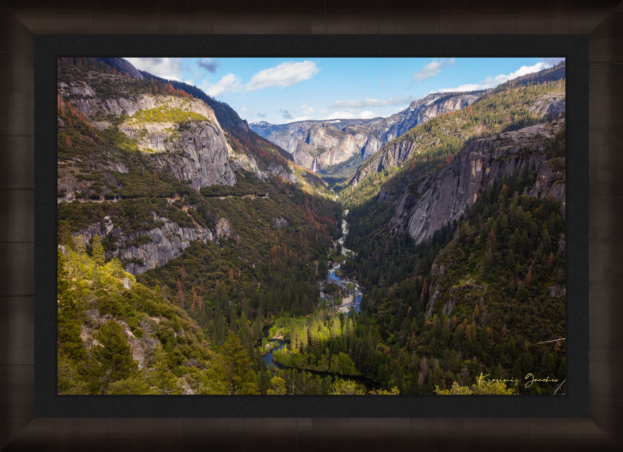 Merced River winding through a wooded valley in Yosemite National Park under daylight and soft evening sun with scattered clouds. #Finish_Roma Dark Ash Frame & Dark Liner