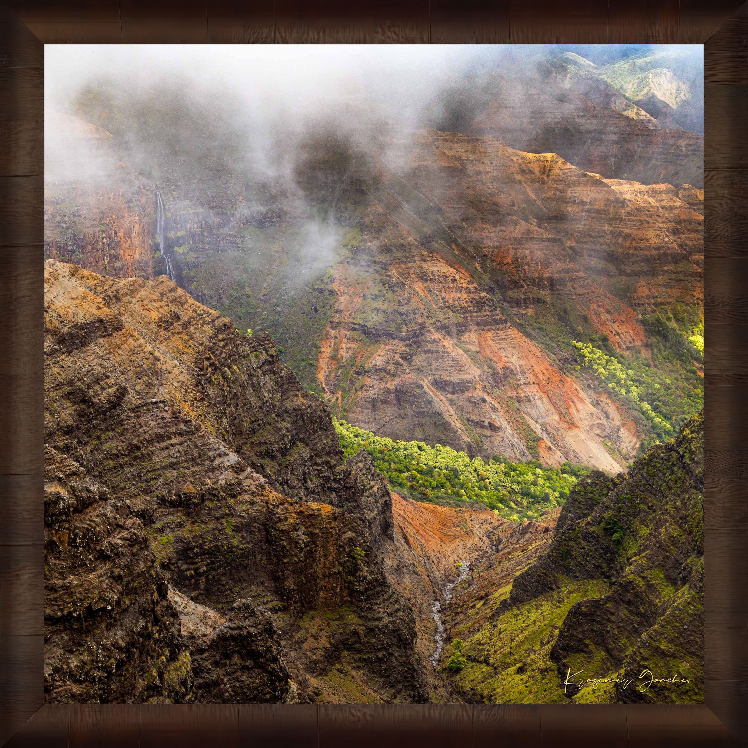 Waterfall descending into Waimea Canyon on Kauai, mist rising through dense foliage in foggy conditions. #Finish_Roma Cigar Leaf Frame